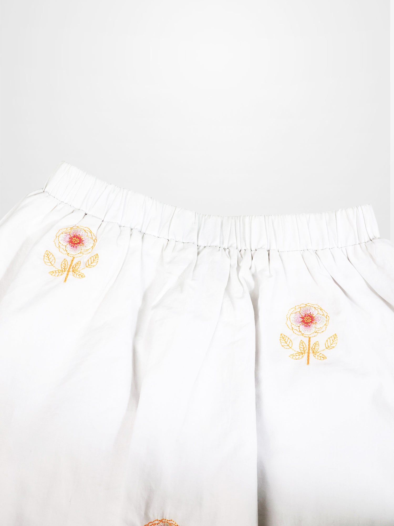 Embroidered Flower Skirt, white cotton girls dressy skirt with two yellow floral embroidery motifs