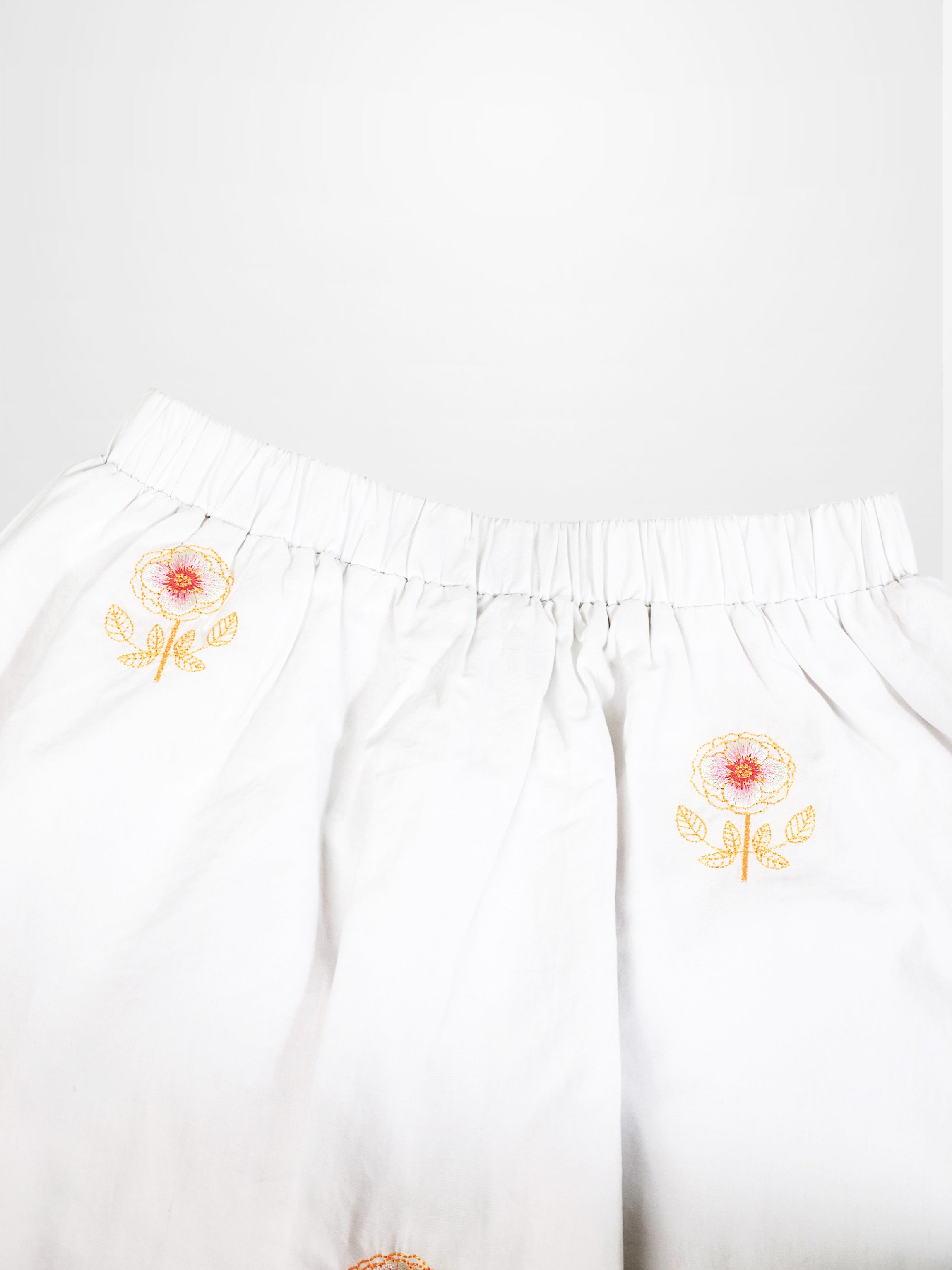 Embroidered Flower Skirt, white cotton girls dressy skirt with two yellow floral embroidery motifs