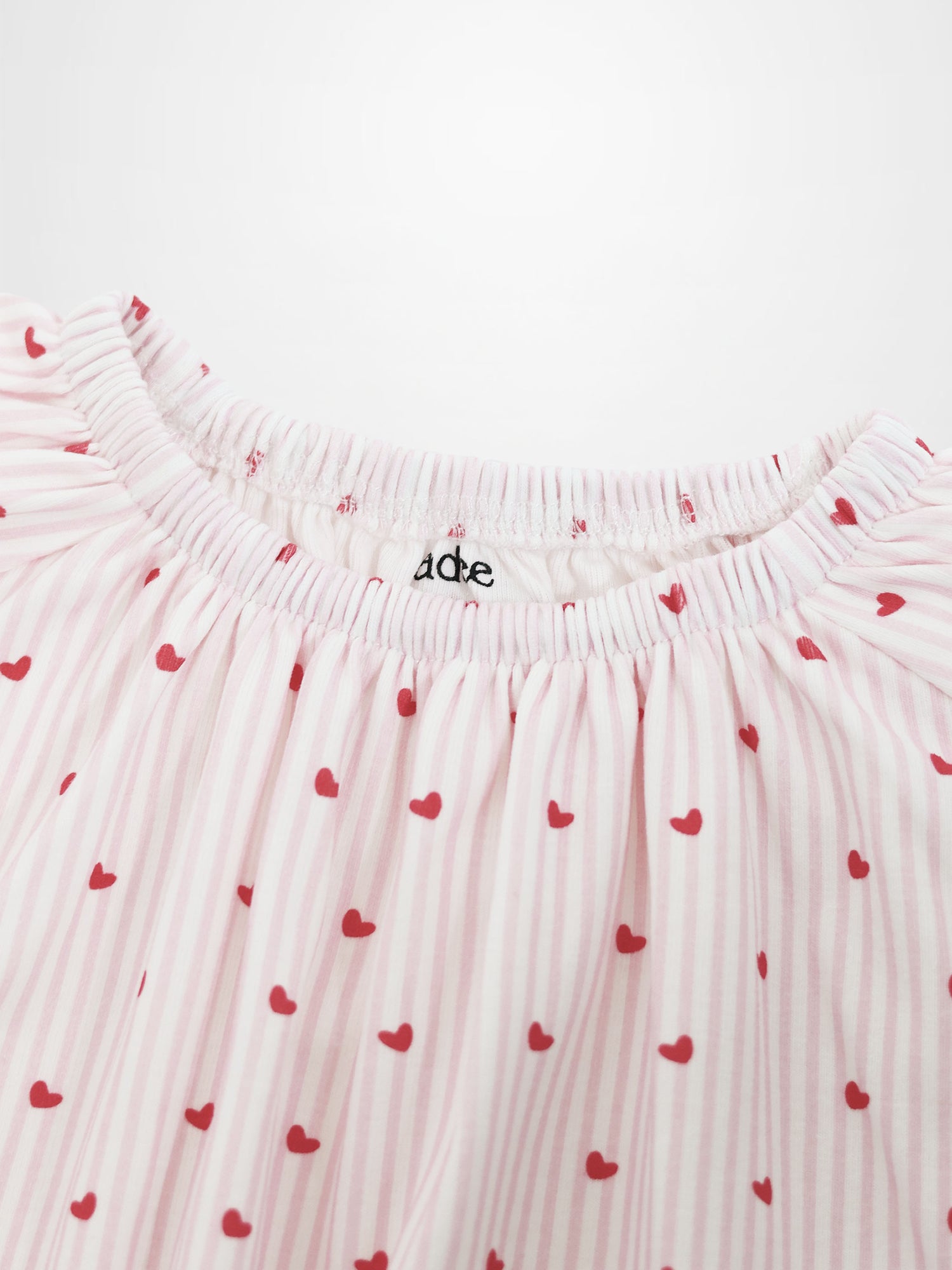 Girls pink heart nightgown by Adee with striped fabric and gathered neckline.