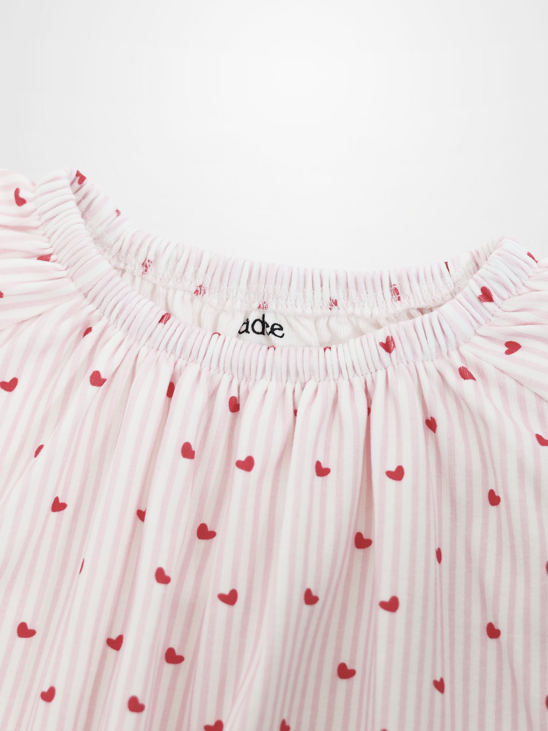 Girls pink heart nightgown by Adee with striped fabric and gathered neckline.