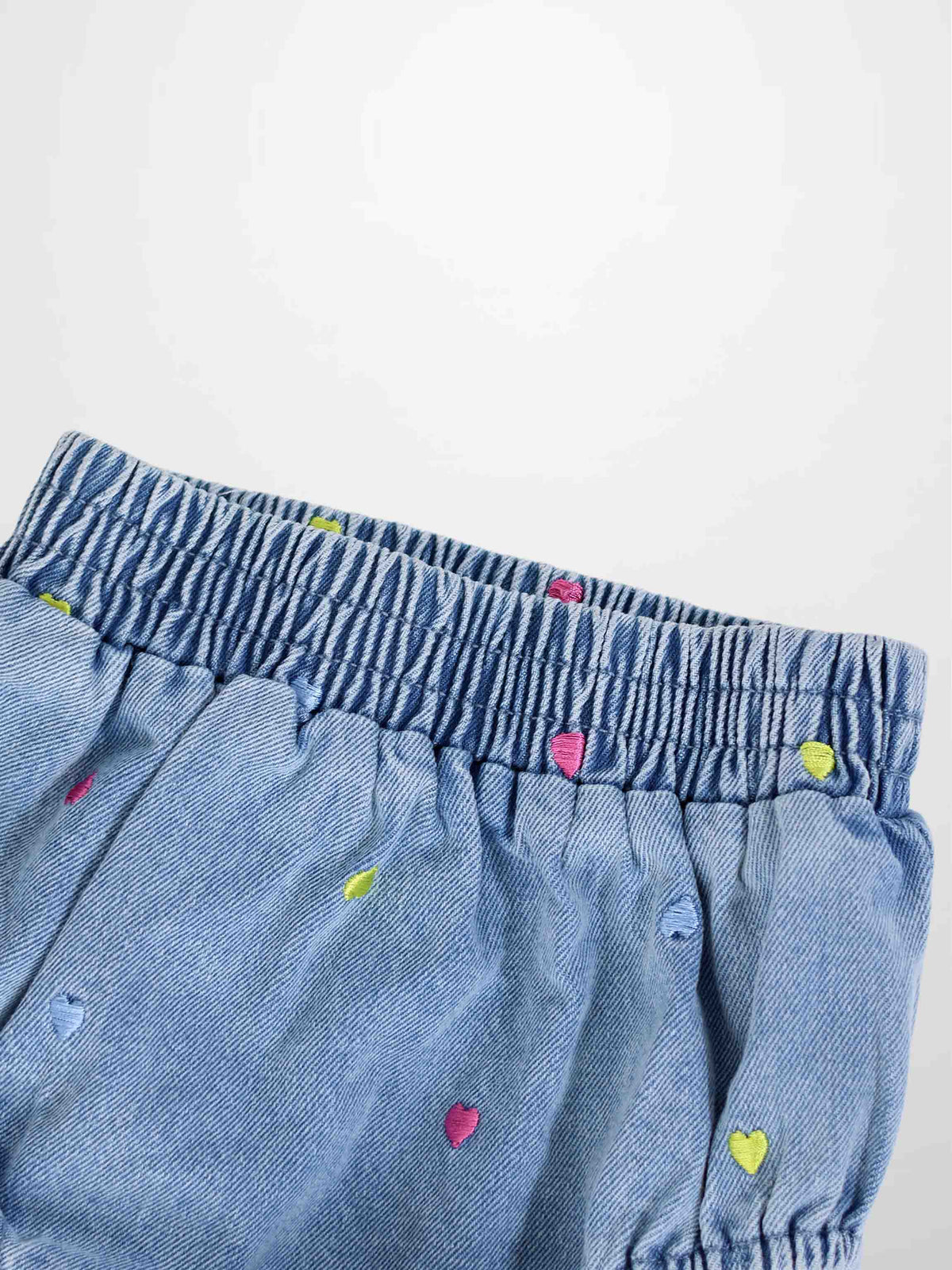 Embroidered Heart Denim Bloomers for girls, light blue denim with pink and lime hearts and an elastic waistband.