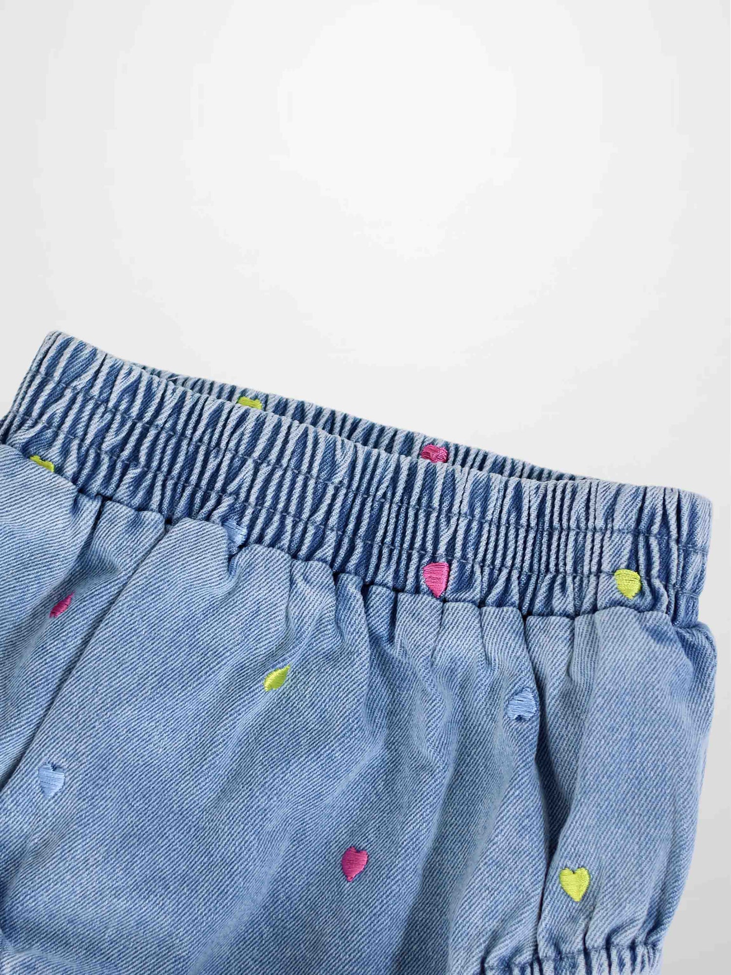Embroidered Heart Denim Bloomers for girls, light blue denim with pink and lime hearts and an elastic waistband.