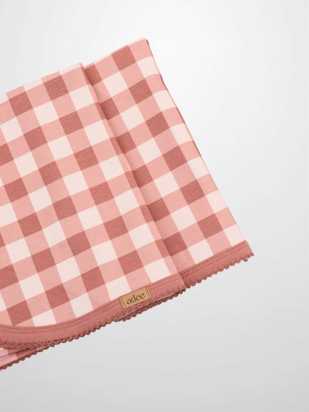 Cherry Frame Blanket receiving blanket in pink-and-white gingham with lace trim by Adee