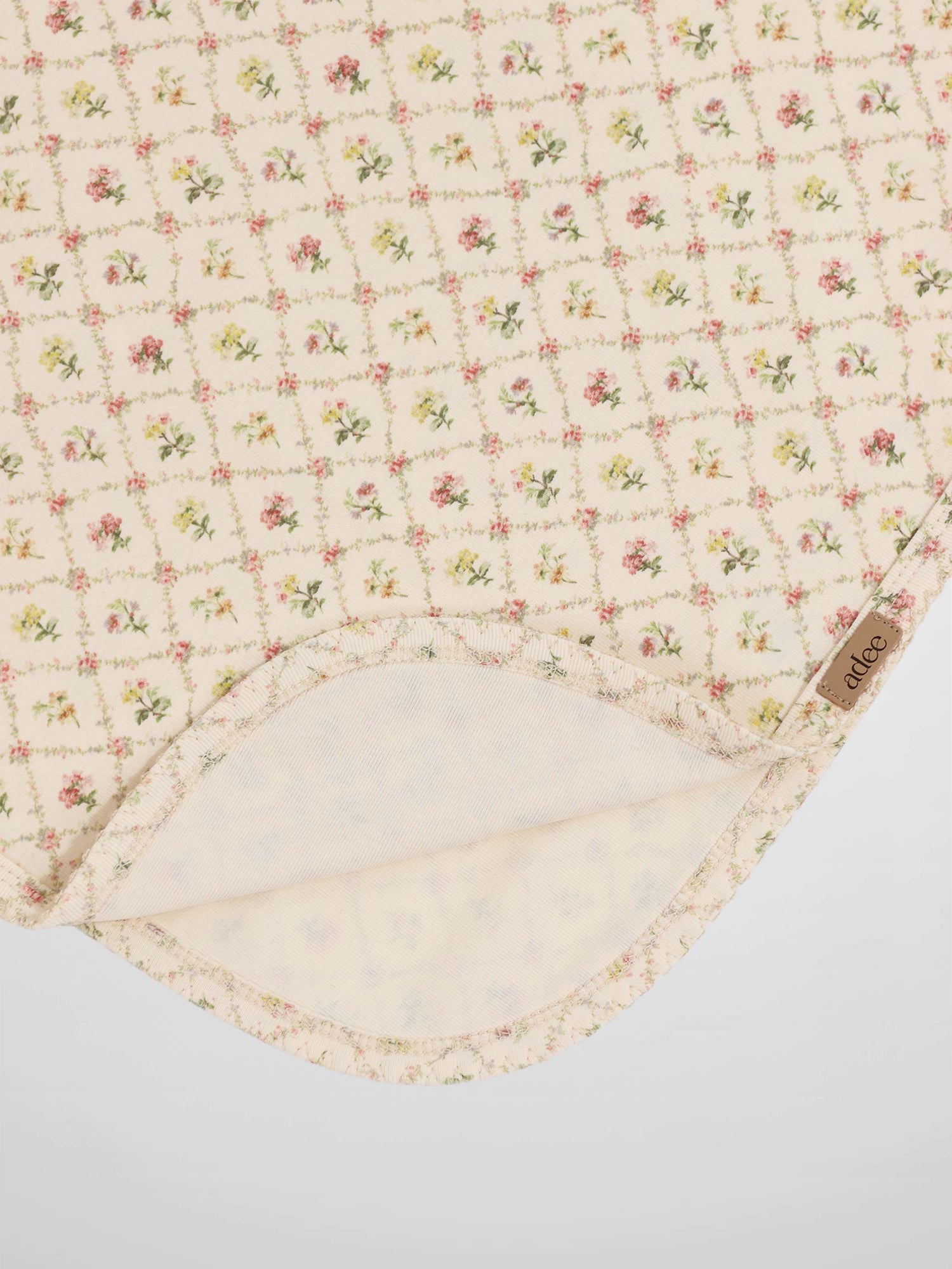 Flower Garden Blanket with Lace swaddle for girls by Adee; cream fabric with small pink and yellow floral lattice pattern