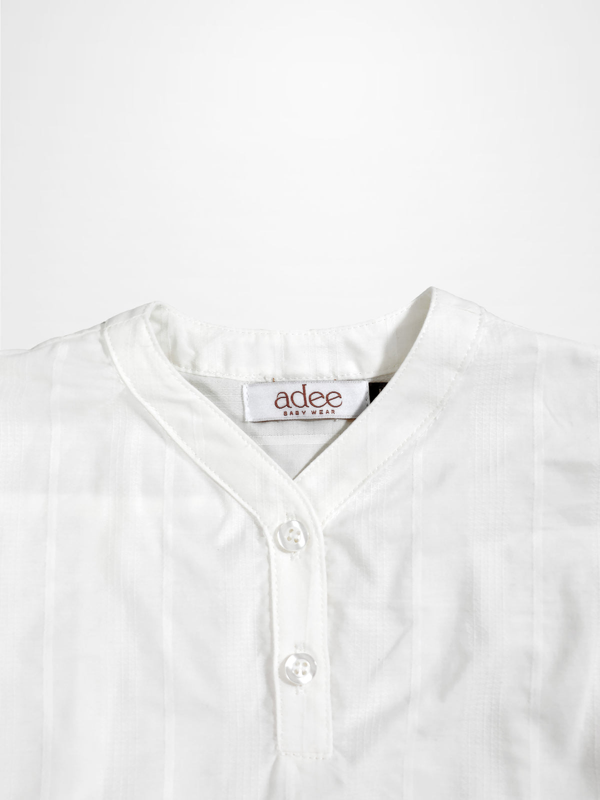 Textured white cotton shirt for boys by Adee; dressy top with button placket.