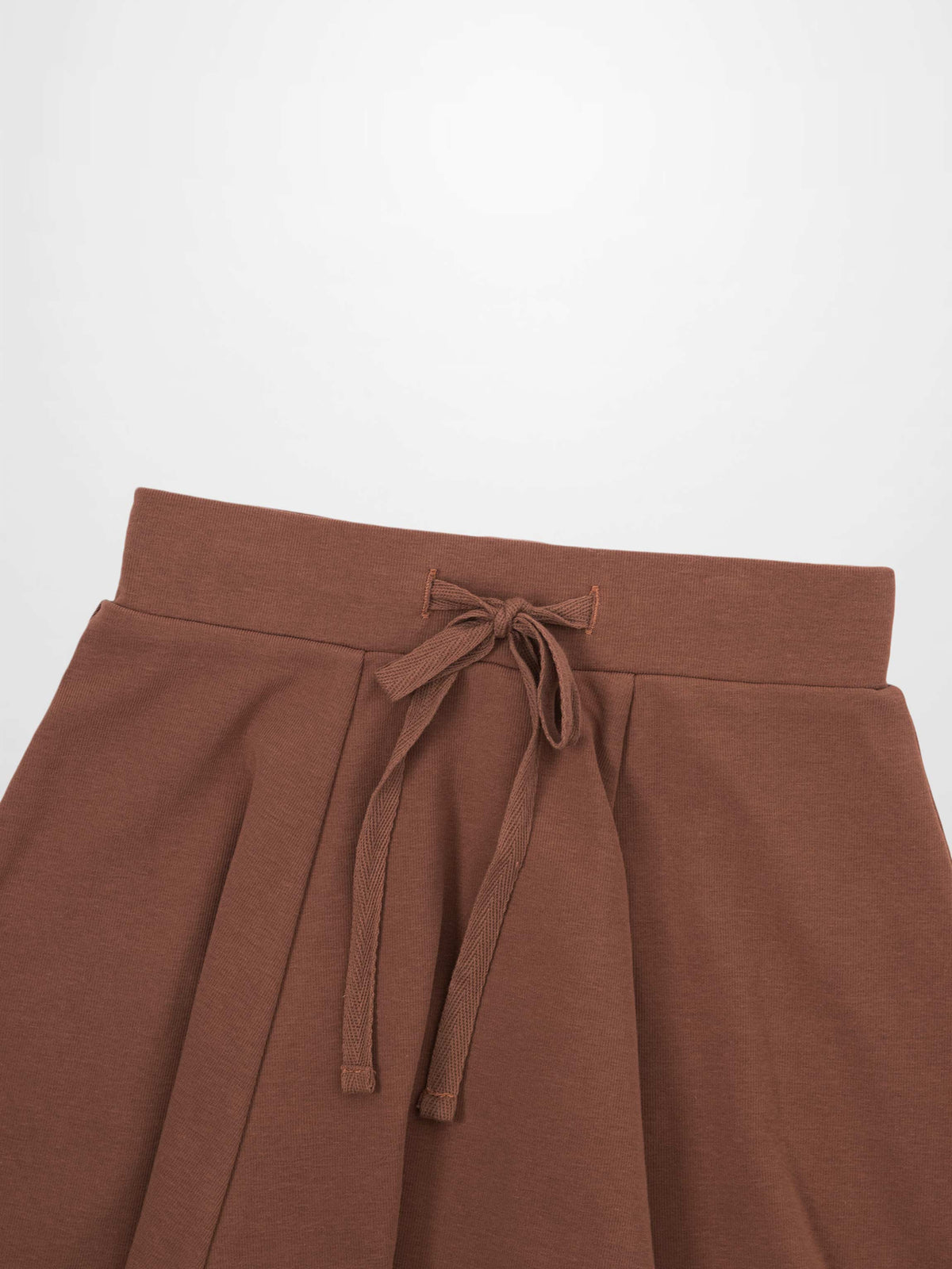 dark mauve six-panel knit skirt with a waist tie