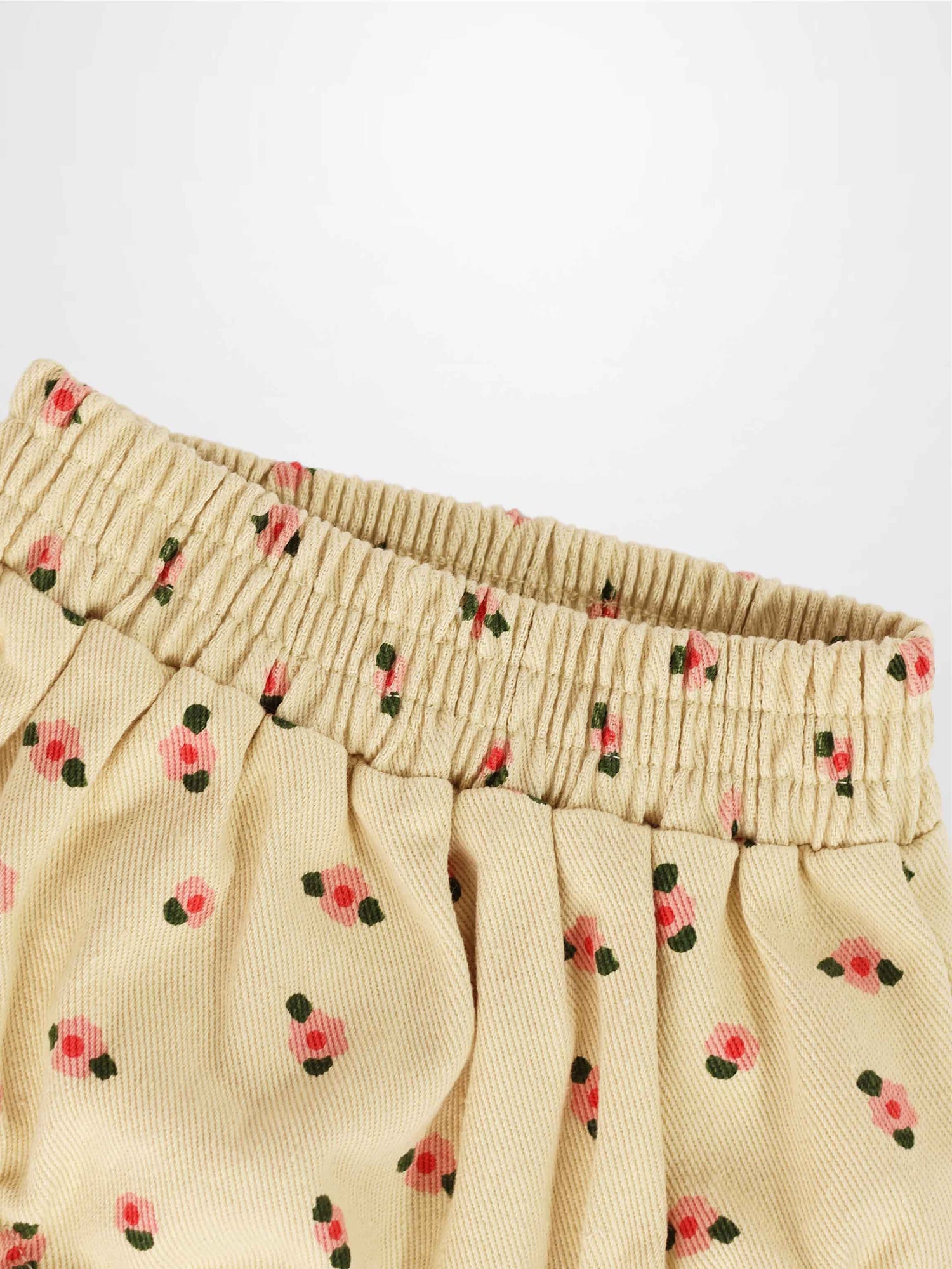 Tan Floral Bloomers with pink flowers and gathered elastic waistband.