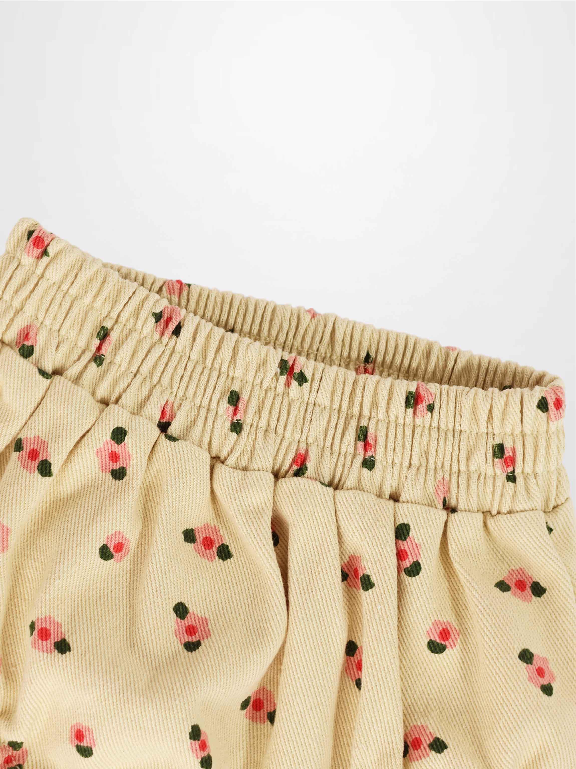 Tan Floral Bloomers with pink flowers and gathered elastic waistband.