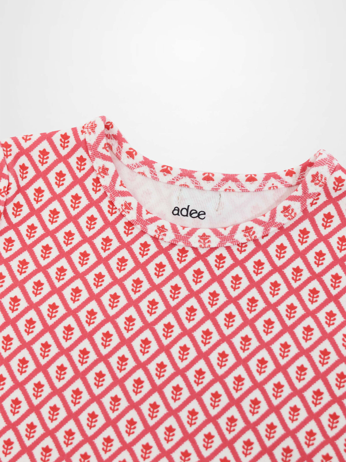 Diamond Flower T-Shirt by Adee, red leaf-pattern on white fabric, girls 3/4 sleeve top.