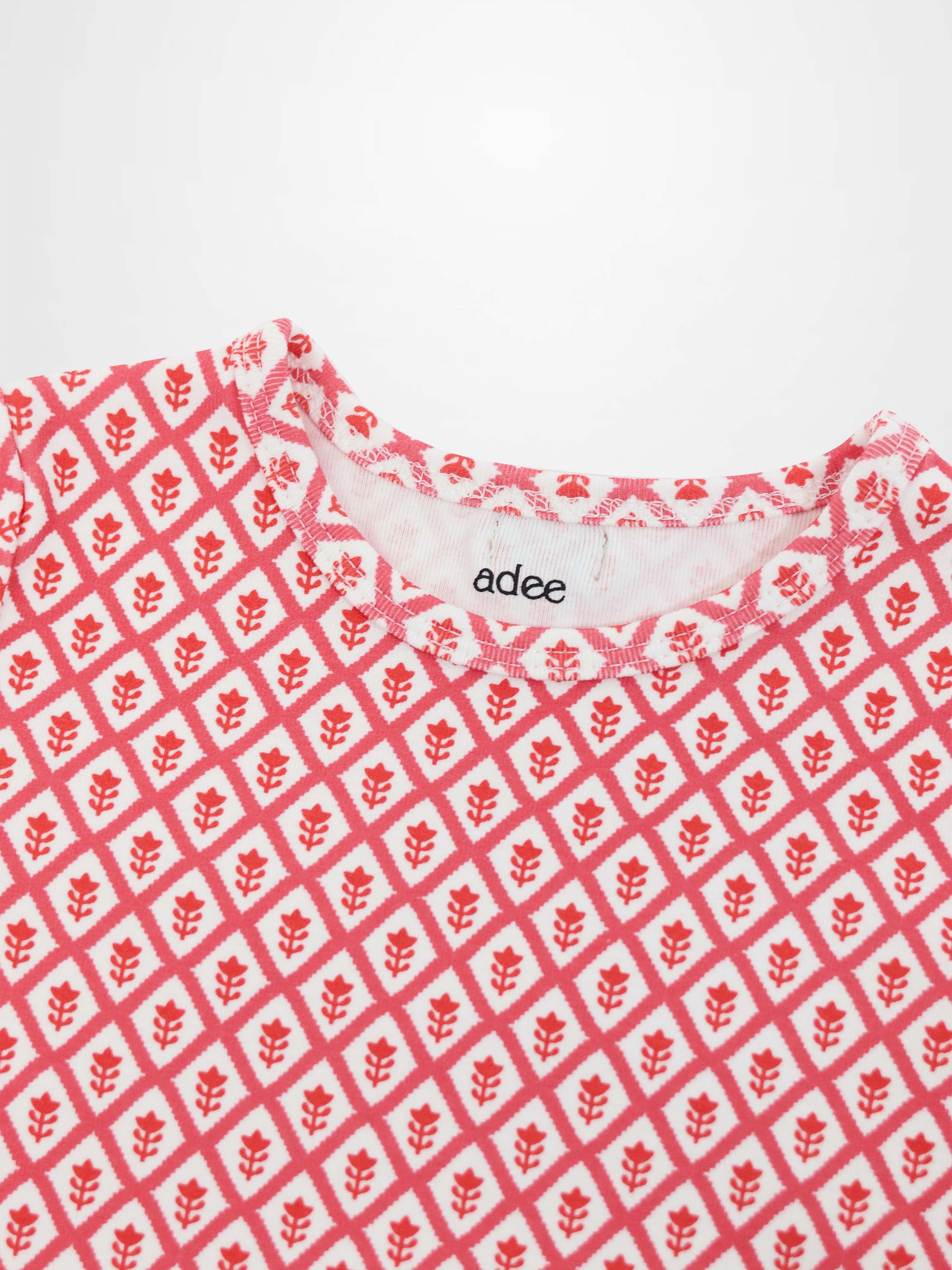 Diamond Flower T-Shirt by Adee, red leaf-pattern on white fabric, girls 3/4 sleeve top.