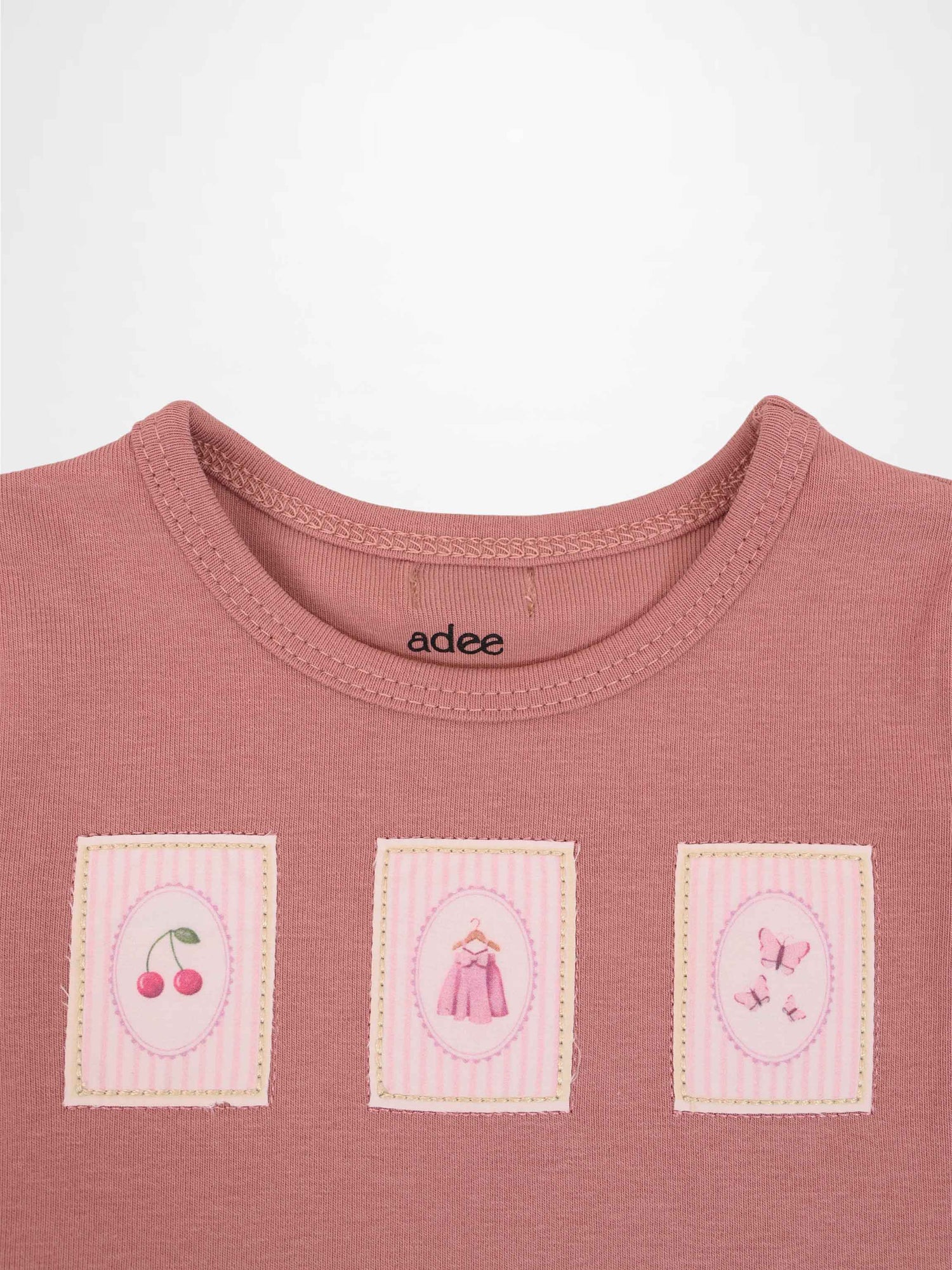 Cherry Frame Set by Adee; pink little girls tee with three framed patches on front featuring cherries, a dress, and butterflies