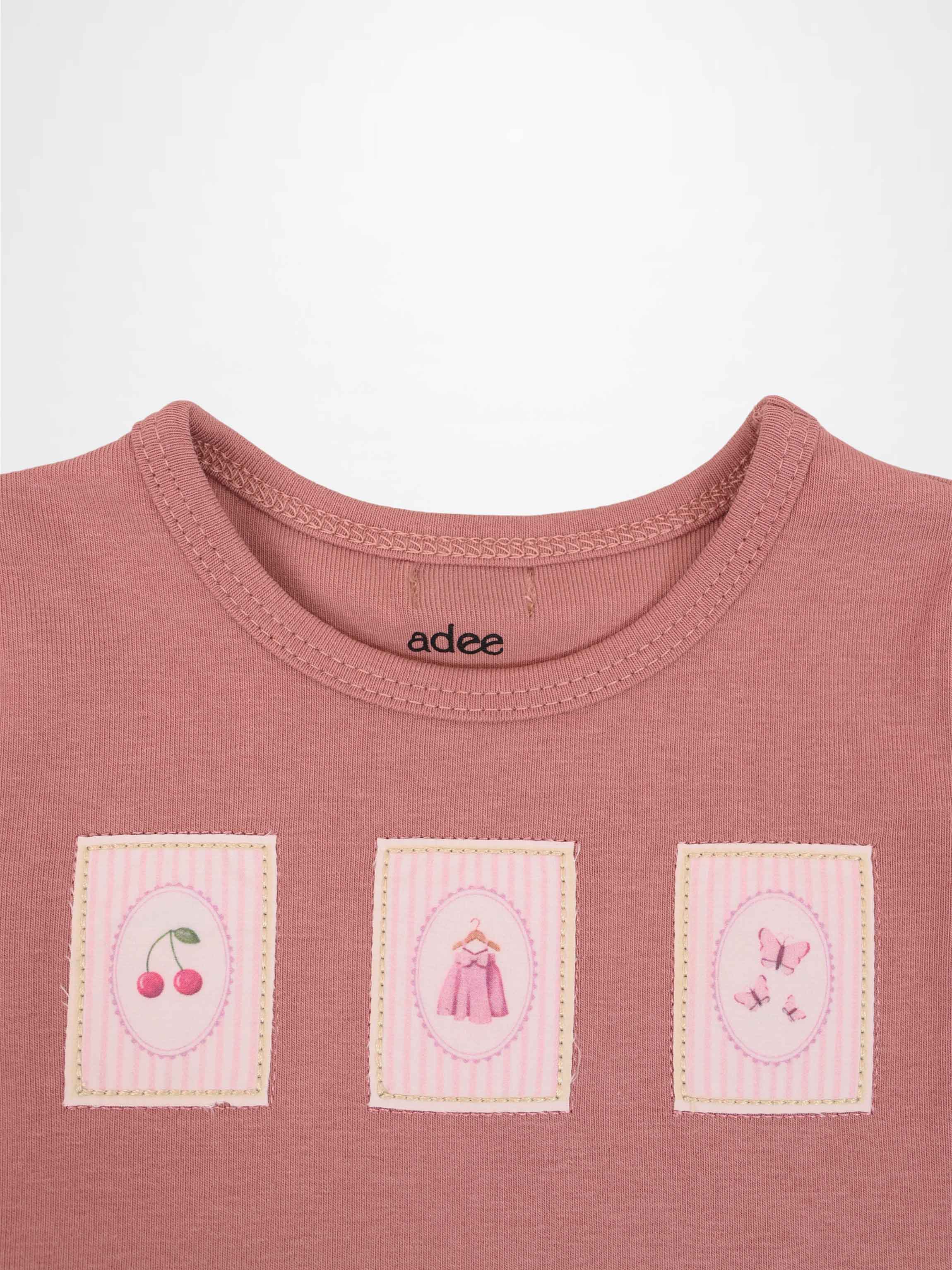 Cherry Frame Set by Adee; pink little girls tee with three framed patches on front featuring cherries, a dress, and butterflies