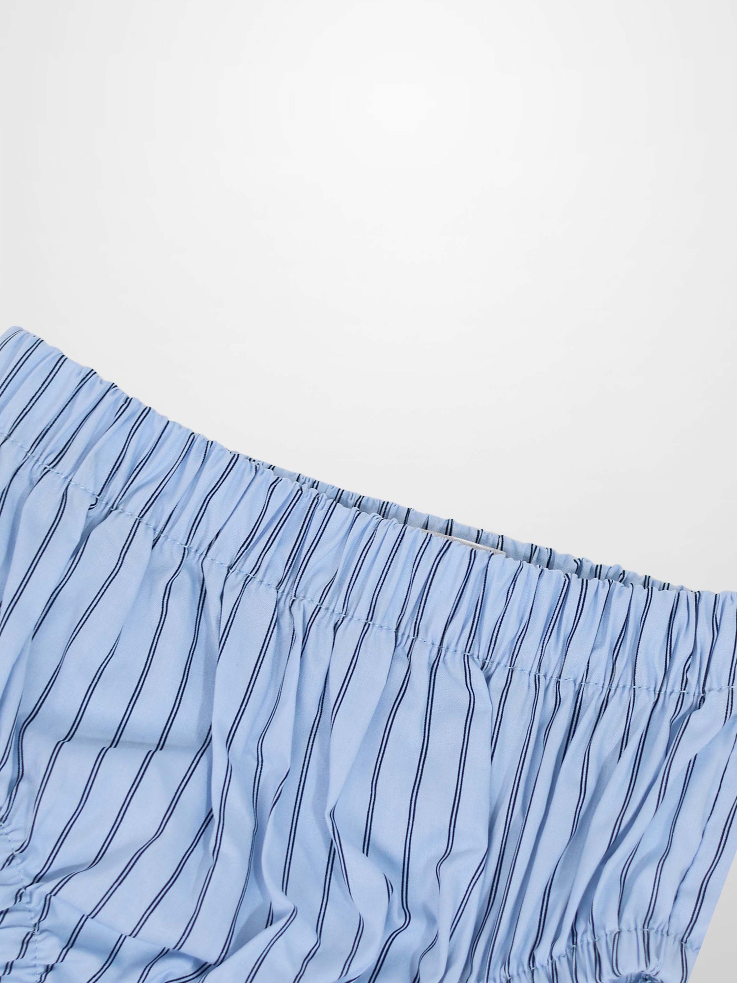 Striped cotton bloomers for boys by Adee, blue with dark vertical stripes and elastic waistband.
