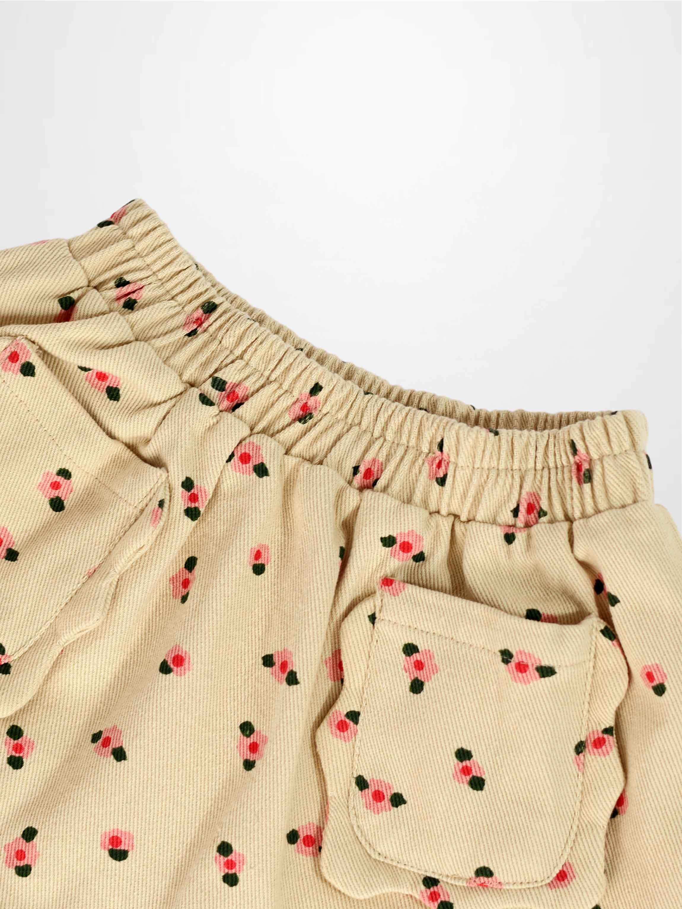 Tan floral girls skirt by Adee with elastic waistband and front pocket