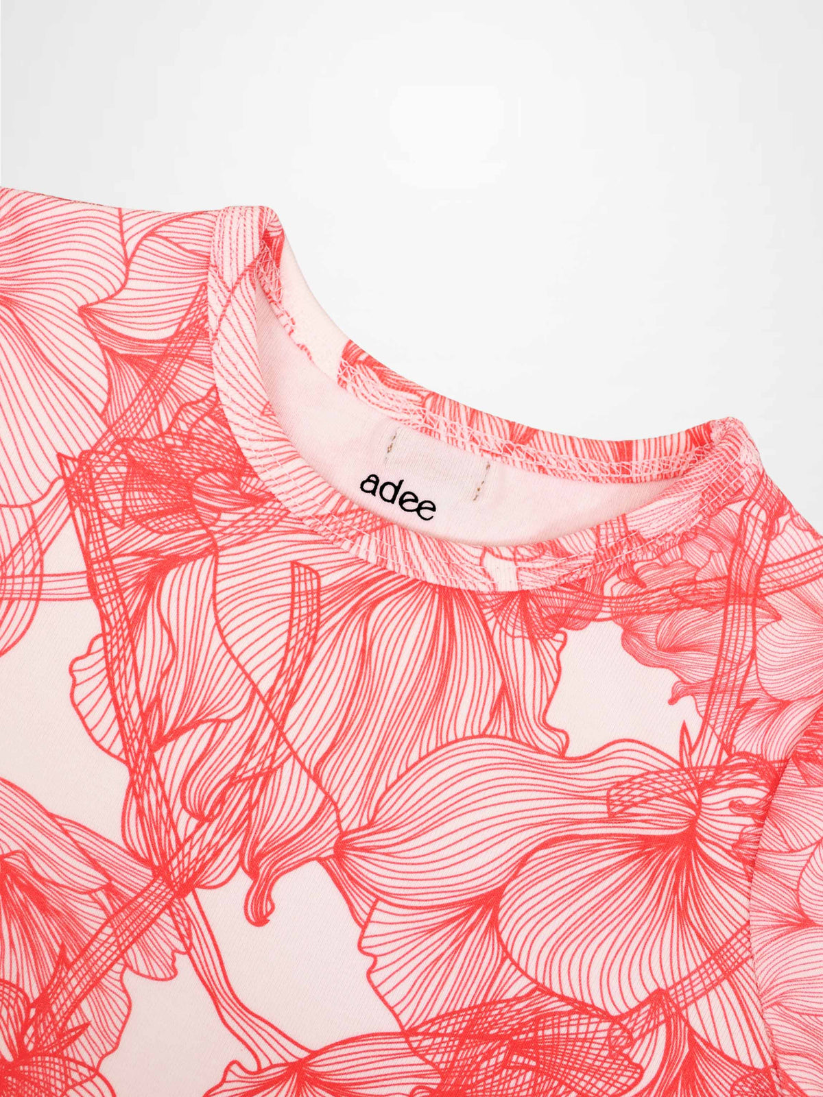 Pink Petal Short Sleeve T-shirt for girls by Adee with red floral pattern.
