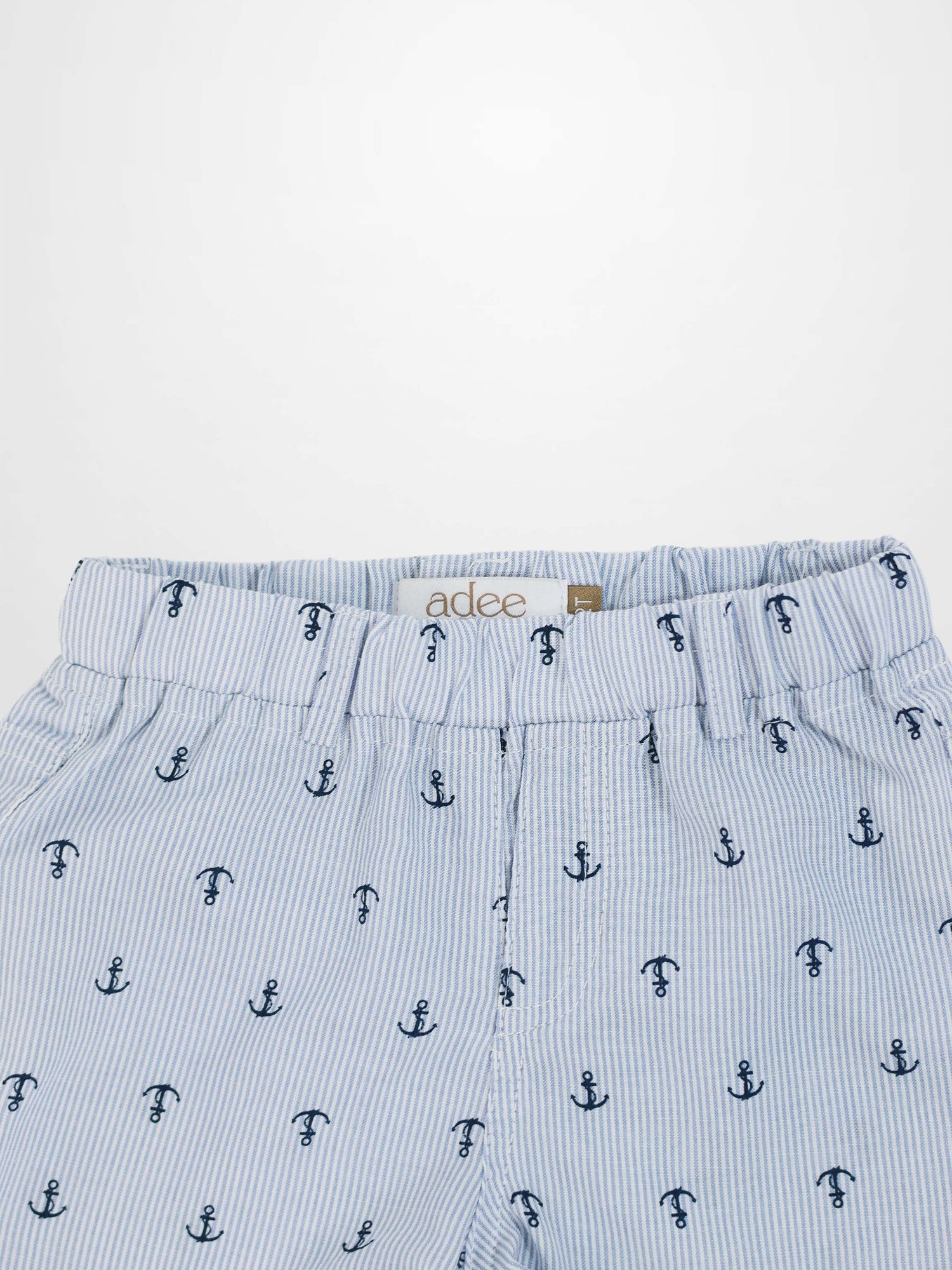 Anchor Shorts in light blue stripes with navy anchor print and elastic waistband.