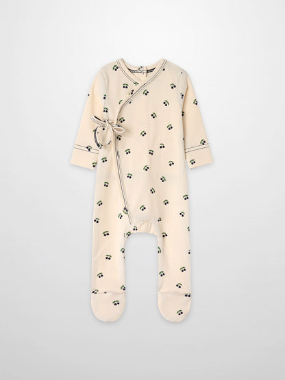 Blue Cherry Stretchy by Adee, boys wrap-style footed onesie with blue cherries on green leaves