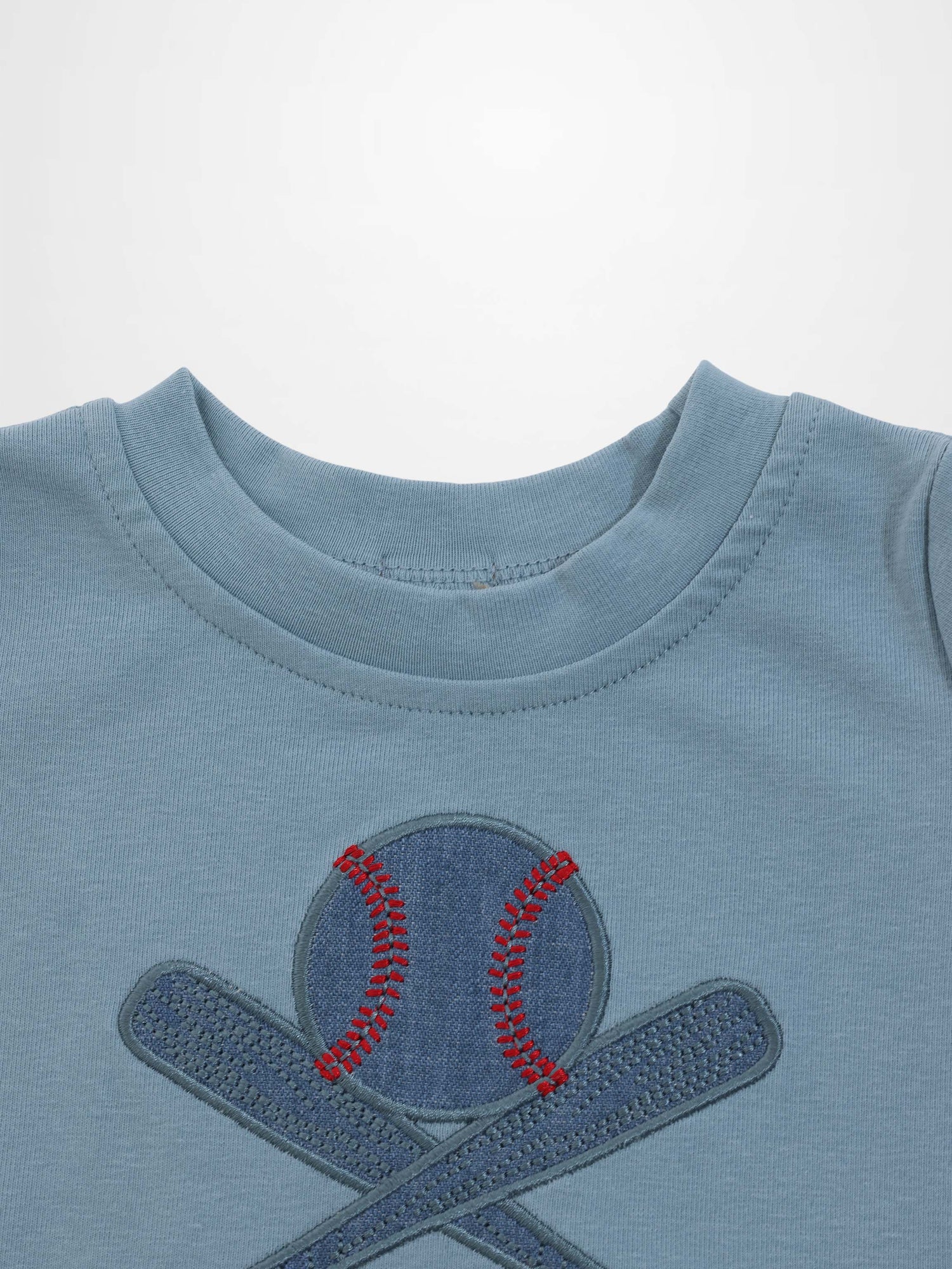 Light blue Baseball T-shirt with embroidered navy baseball and crossed bats design.