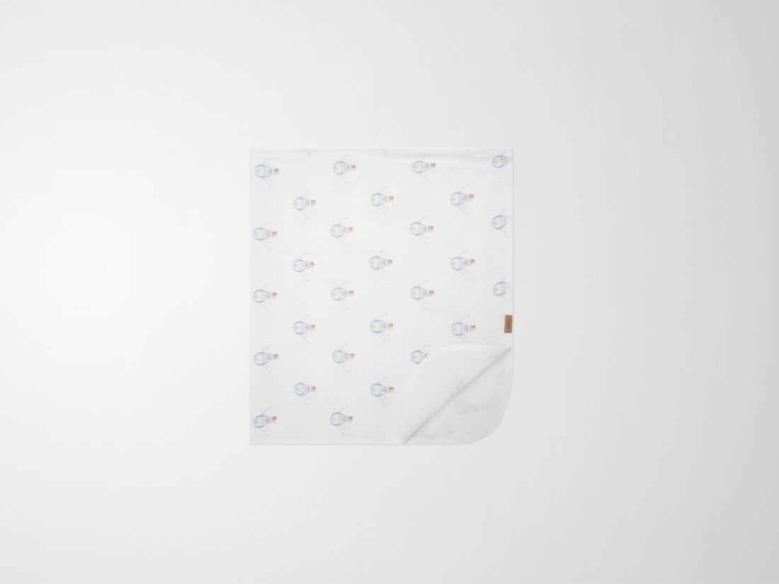 Blue Balloon Blanket by Adee; white boys swaddle blanket with light blue balloon pattern