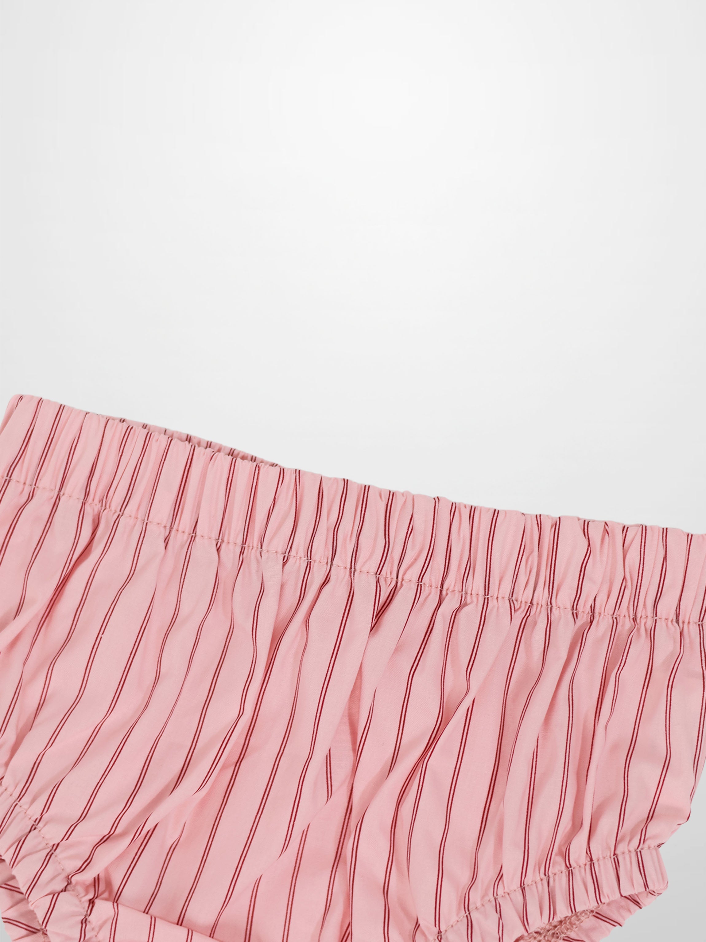 Pink cotton bloomers with vertical red stripes and an elastic waistband.
