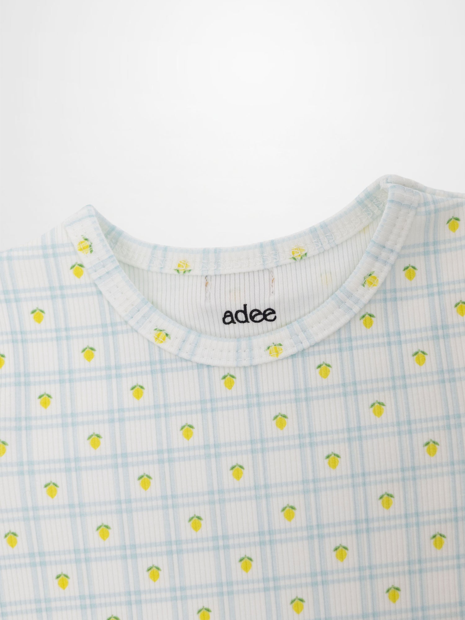 Lemon Window Pajamas top in light blue plaid with tiny yellow lemons on white base; crew neck.