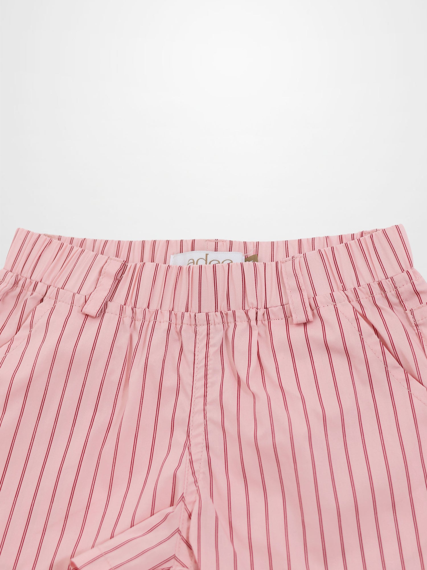 Striped cotton shorts for girls in pink with red stripes, Adee brand, elastic waistband.