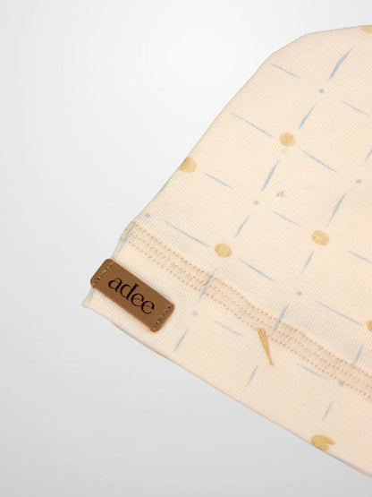 Grand Slam Hat for boys by Adee, cream fabric with pale blue strokes and yellow dots