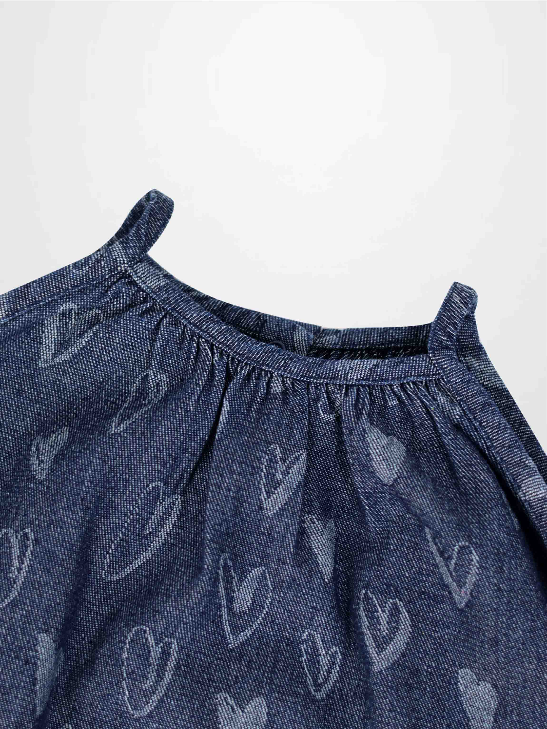 Denim Heart Jumper dress for girls by Adee, blue denim with white heart prints and gathered neckline.