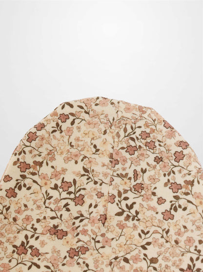 Purple Flower Hat for girls by Adee with an all-over floral print on beige fabric.