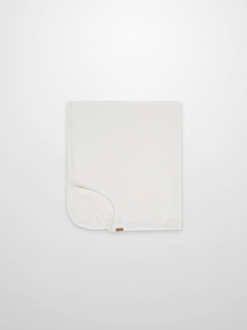 Thin Ribbed Blanket - White by Adee; unisex blanket