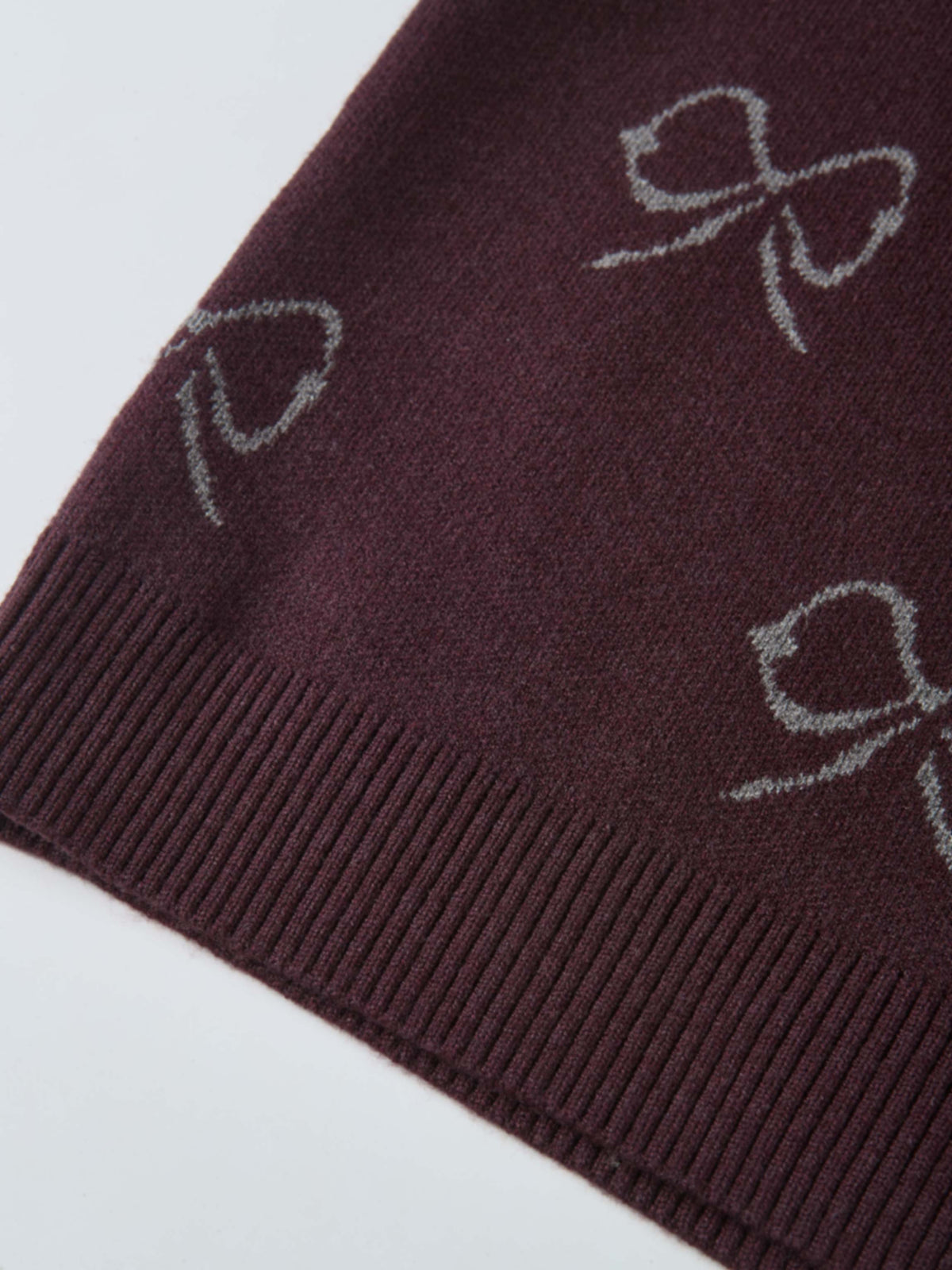 Bow Knit Sweater in burgundy with white bow motif; girls dressy top
