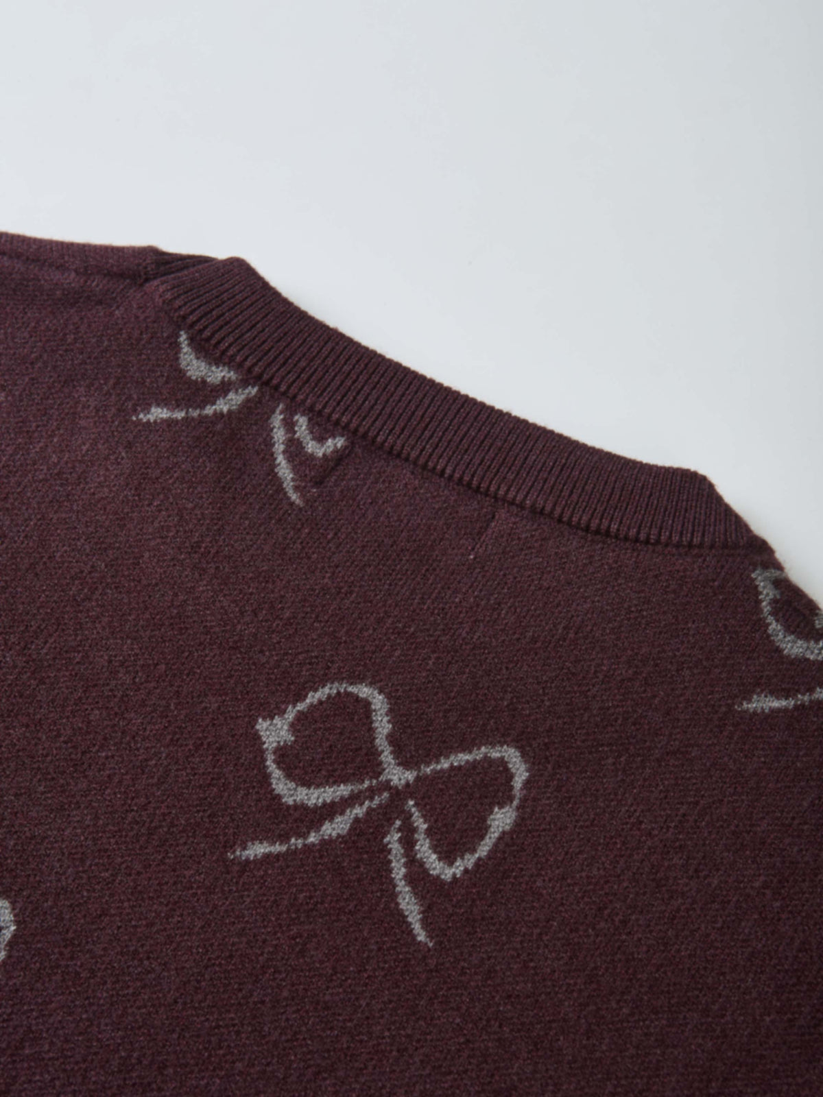 Bow Knit Sweater Burgundy for girls by Adee; dressy knit top with gray bow motifs.