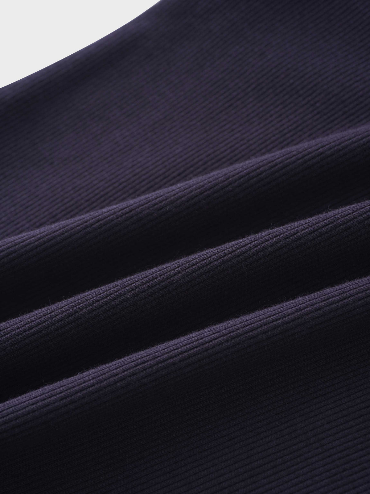 Close-up of soft navy ribbed fabric from Crossover Thin Ribbed Pajama.