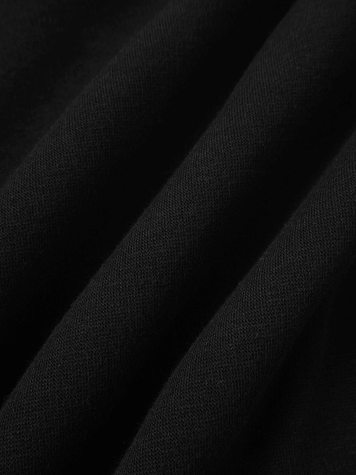 Close-up of black Skyline Sweatshirt knit fabric showing soft, cozy texture.