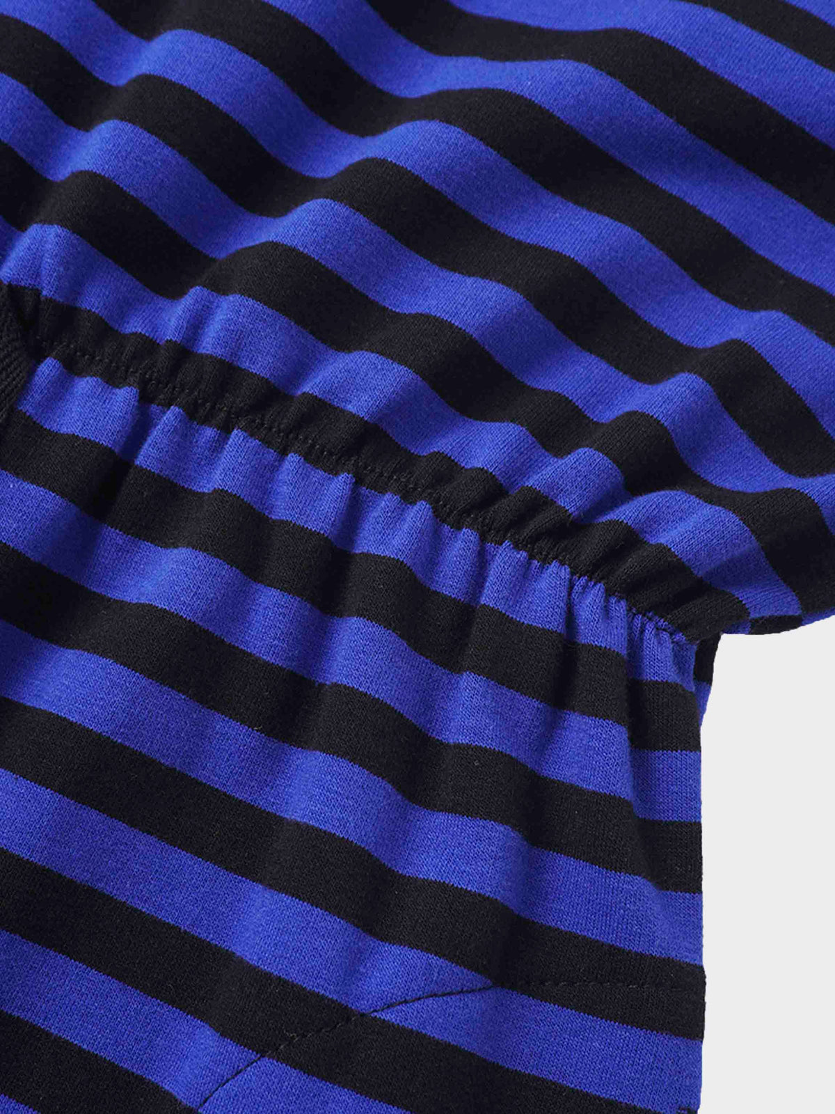 Striped blue and black sweatshirt dress with gathered waist, long sleeves, cozy knit fabric.