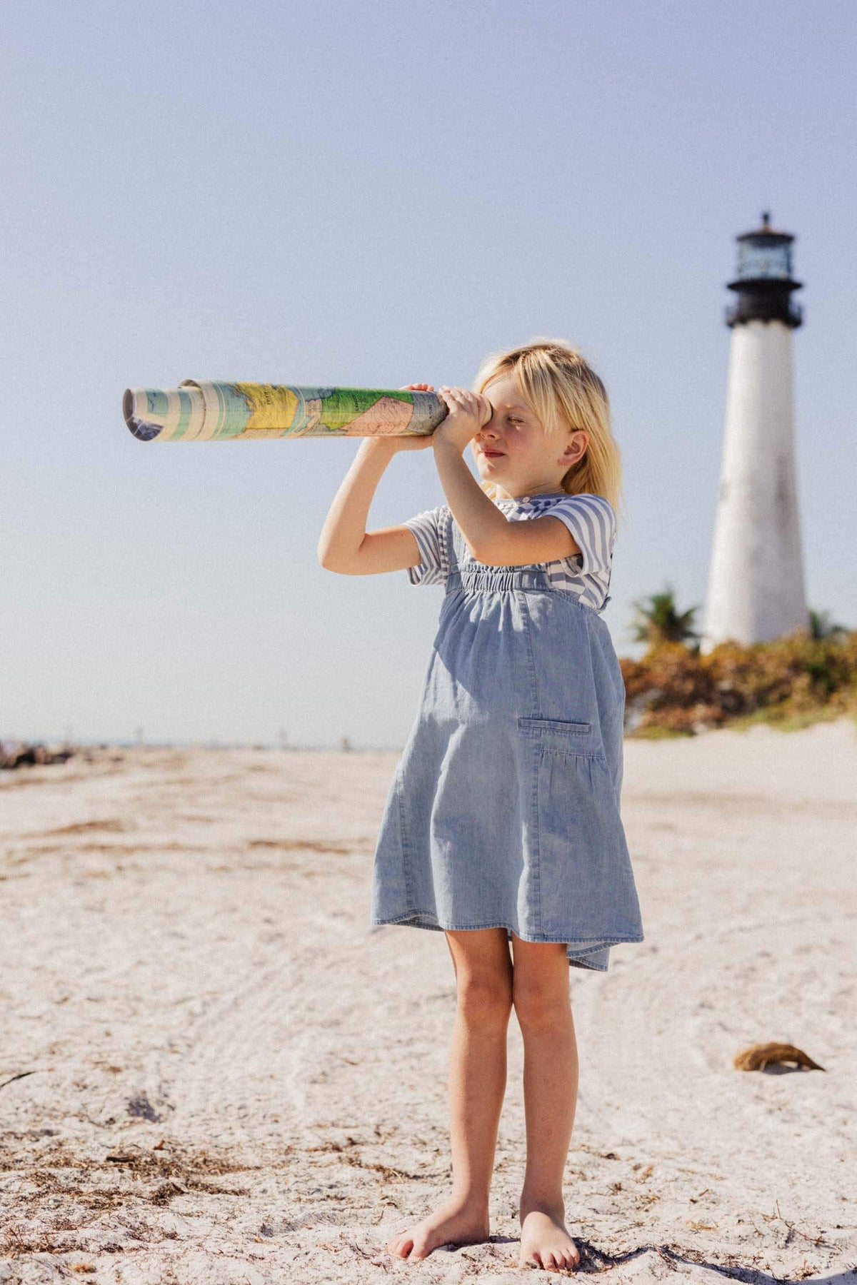 Girl with striped t-shirt exploring