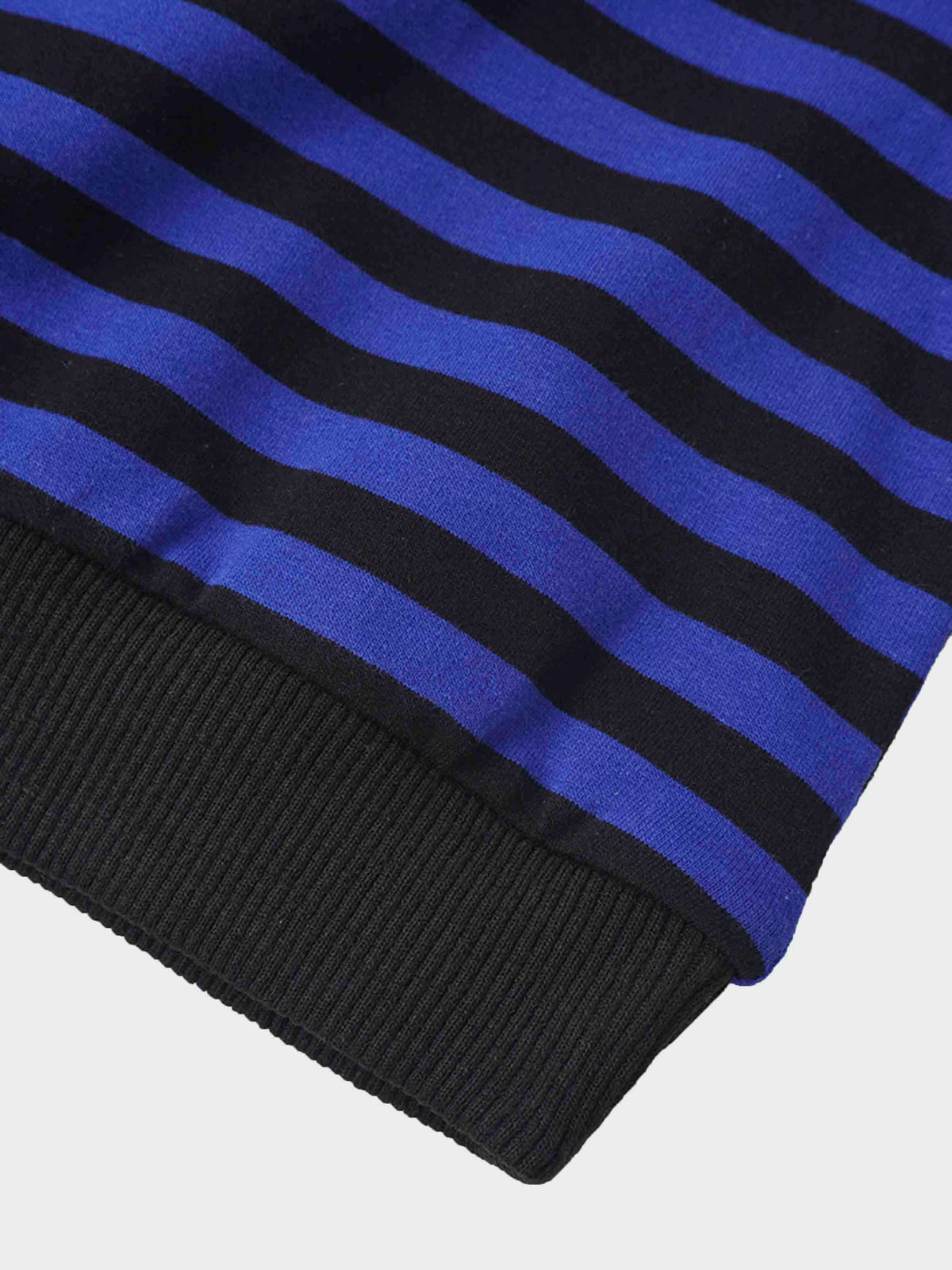 Blue and black striped sweatshirt cuff with black ribbed hem.