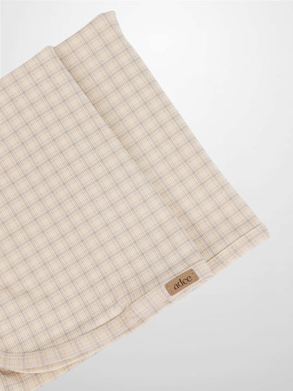 Oatmeal Grid Blanket blue by Adee, a boys swaddle blanket with light blue and brown grid.