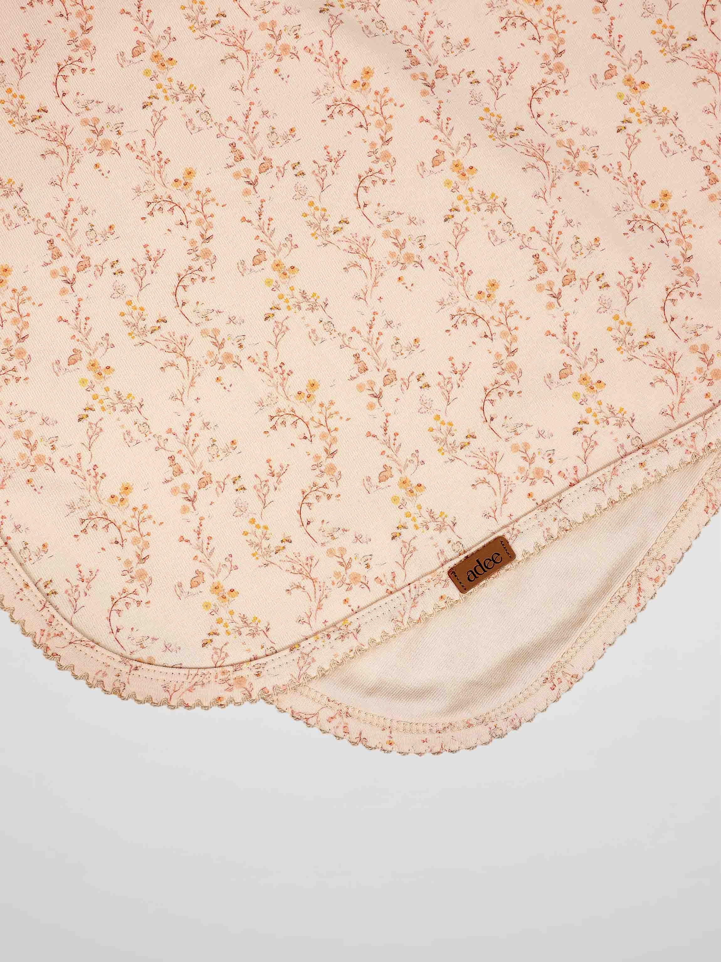 Sweet Meadow Blanket by Adee, pink floral girls swaddle receiving blanket with scalloped lace trim.