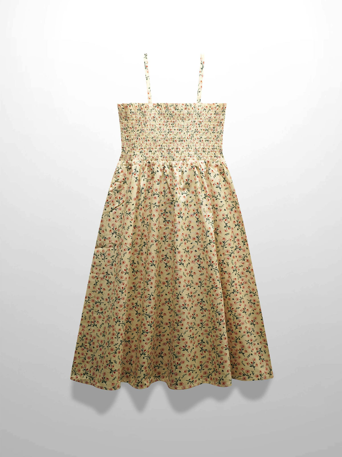 Beige floral sundress with smocked bodice, pleated trim, and thin straps; pink and green blossoms.