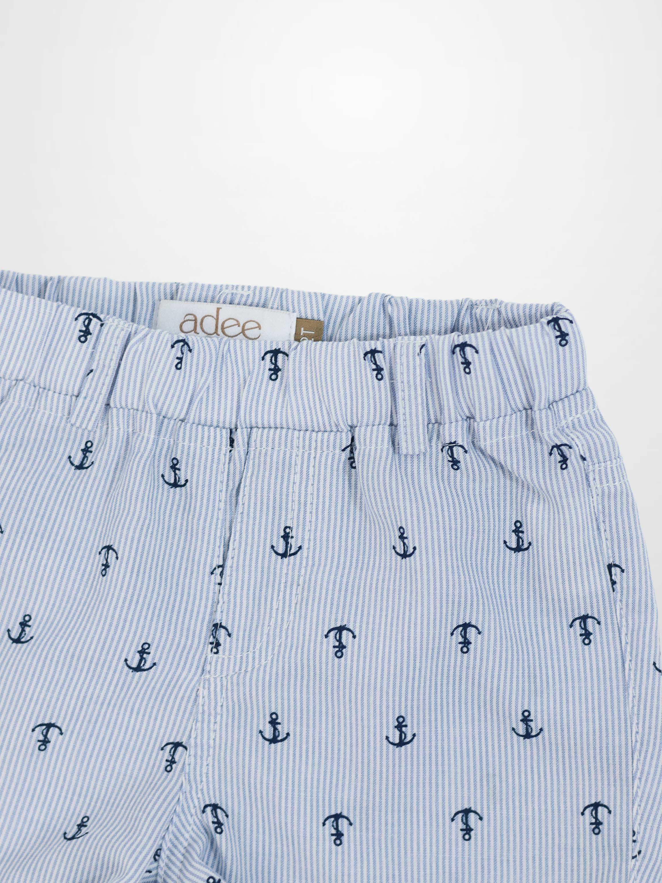 Anchor Shorts for boys by Adee; light blue pinstripe fabric with navy anchor prints and elastic waistband.