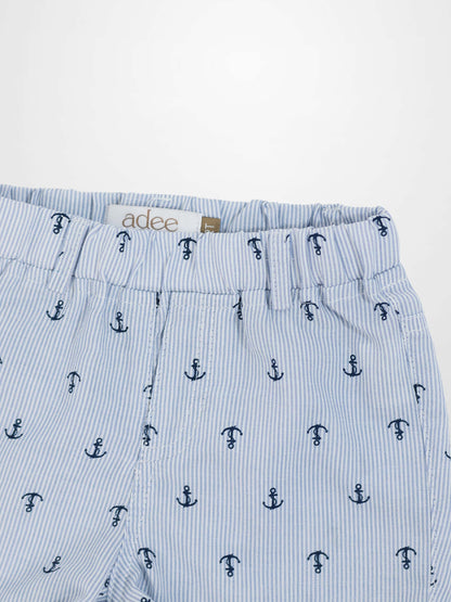 Anchor Shorts for boys by Adee; light blue pinstripe fabric with navy anchor prints and elastic waistband.