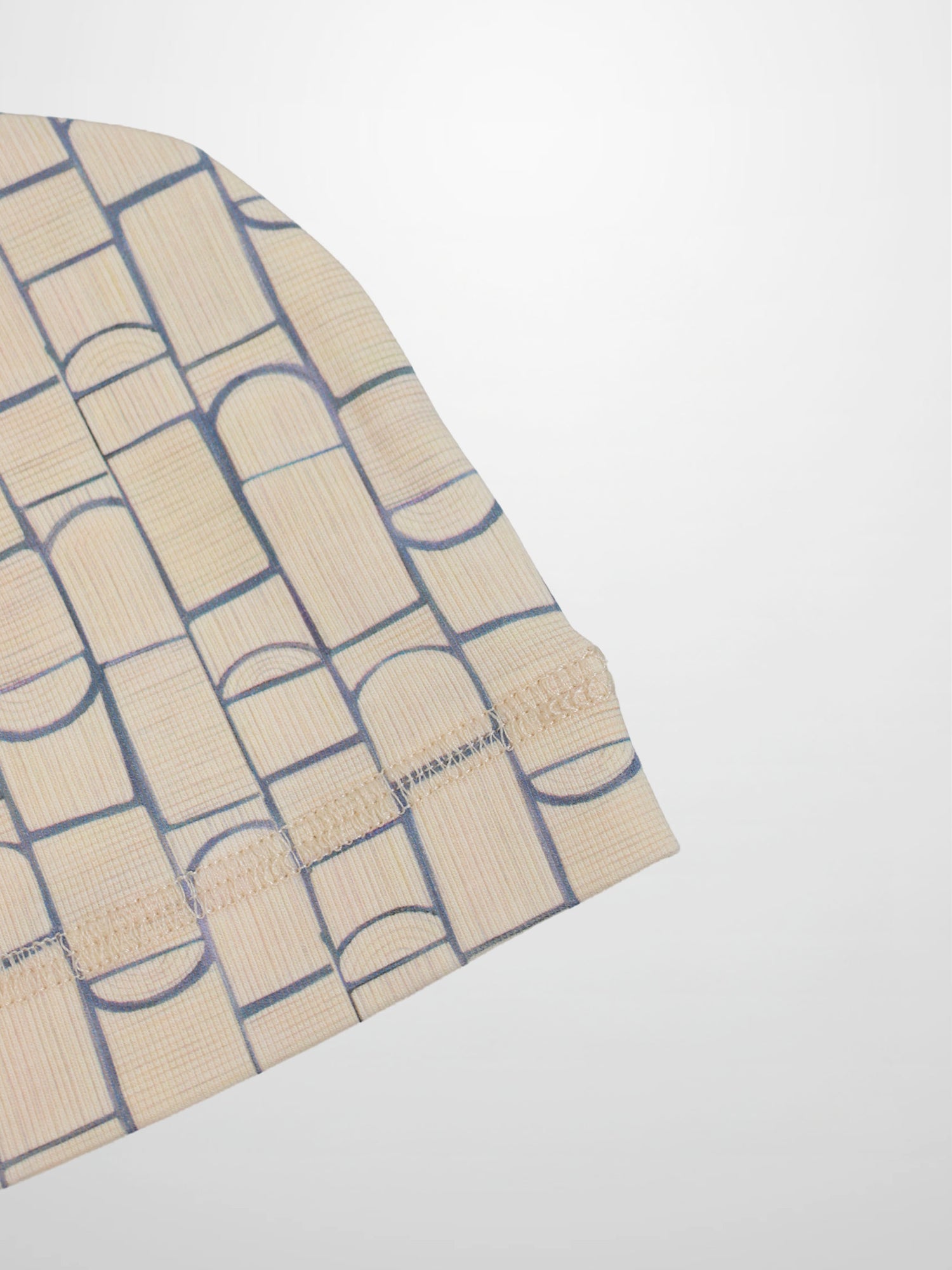 Geometric Hat Adee; beige base with light blue geometric pattern for boys