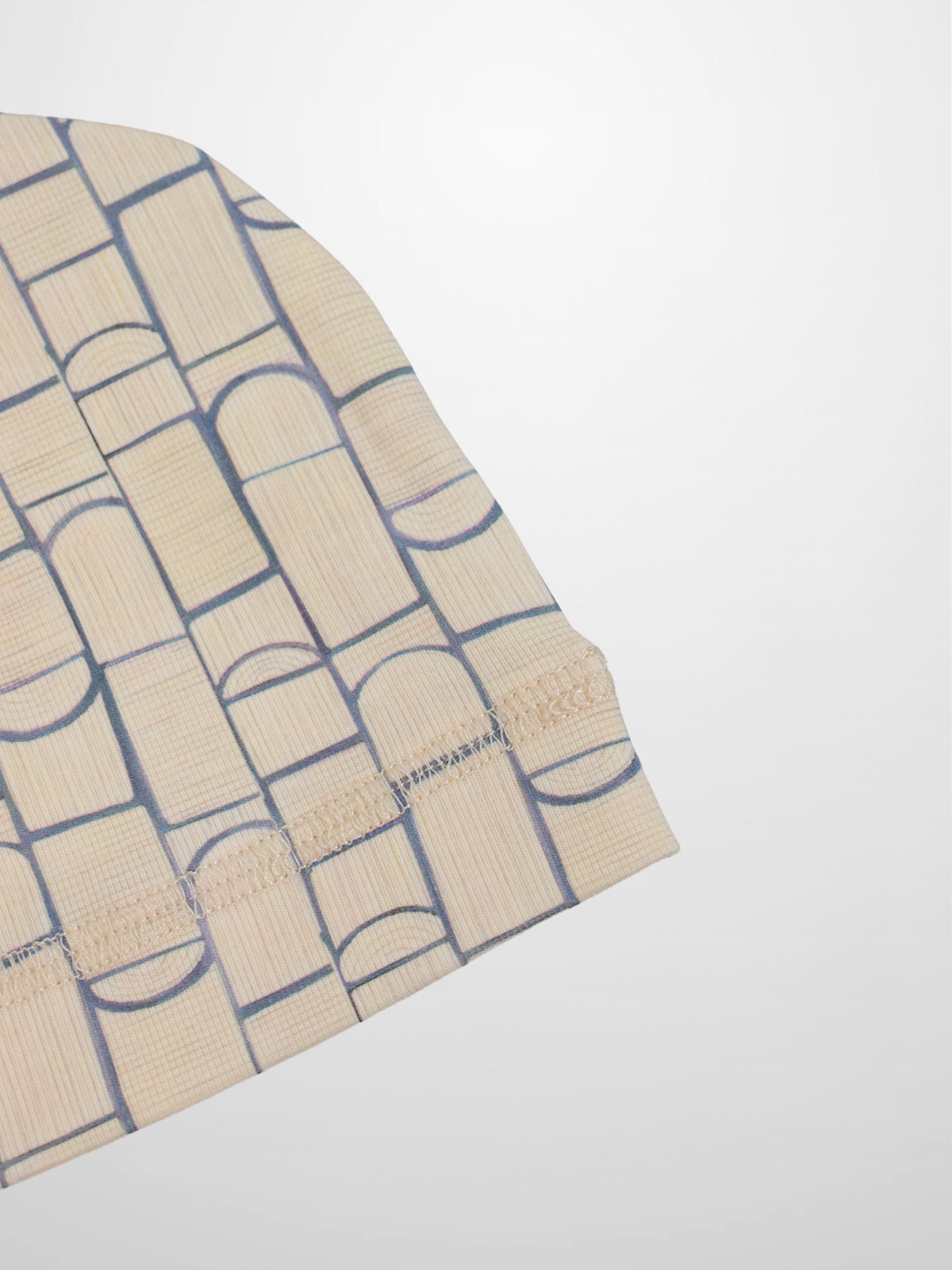 Geometric Hat Adee; beige base with light blue geometric pattern for boys