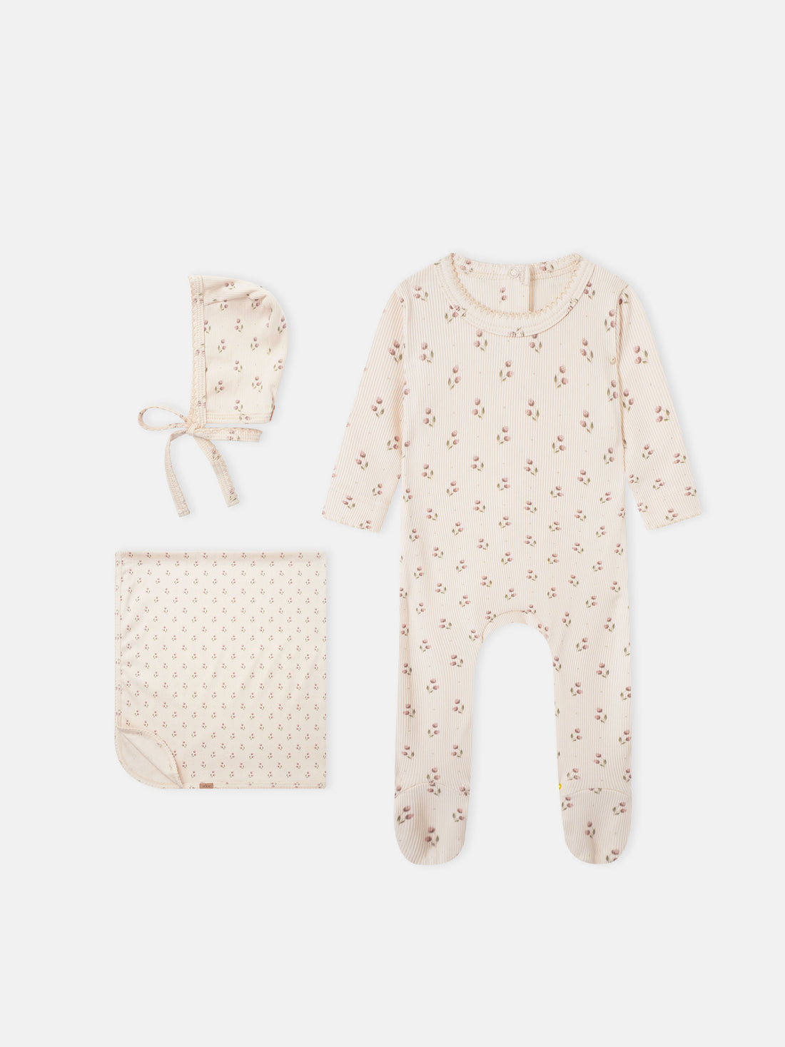 Tiny Tulip layette set: cream ribbed floral print for girls, includes a onesie, hat, and blanket.
