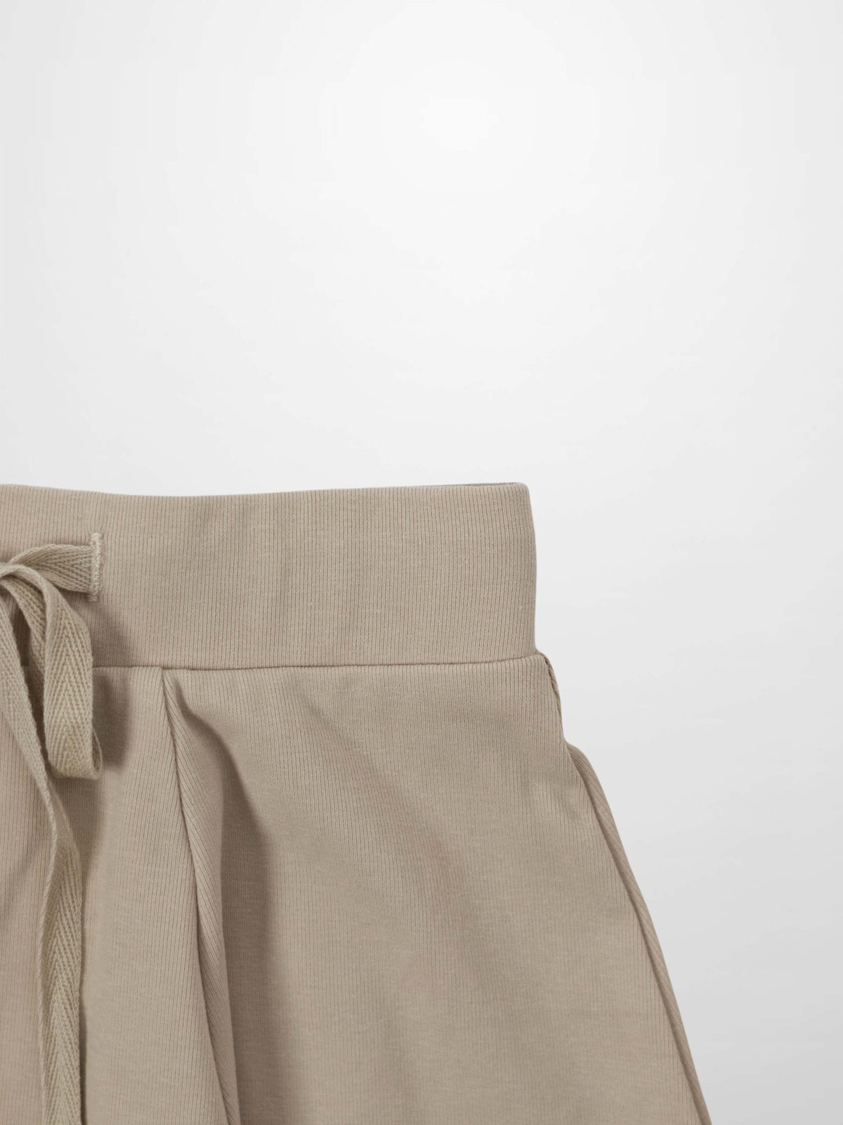 Taupe 6-panel skirt with drawstring waist.