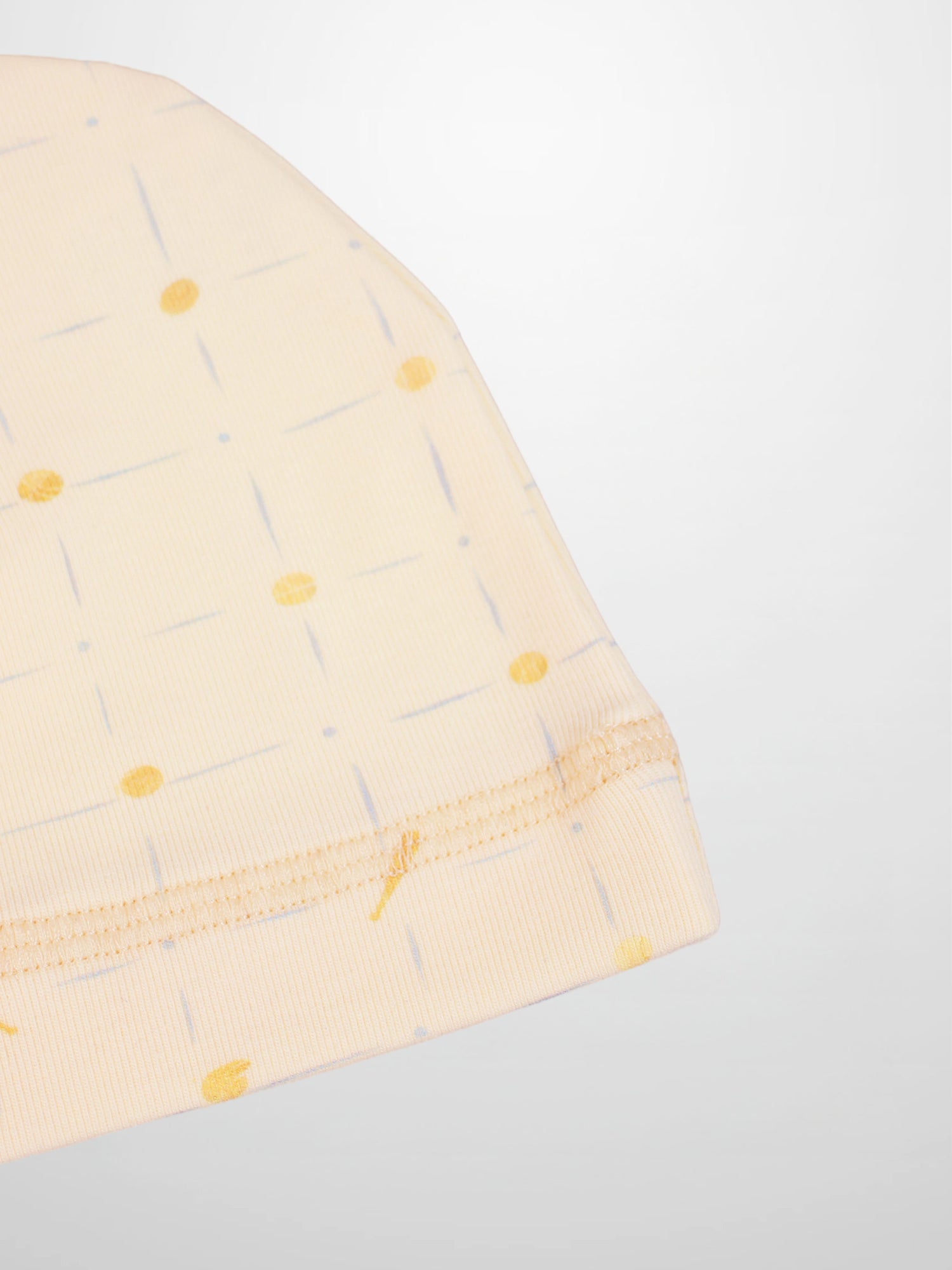 Grand Slam Hat for boys by Adee; peach fabric with thin pale blue strokes and yellow dots