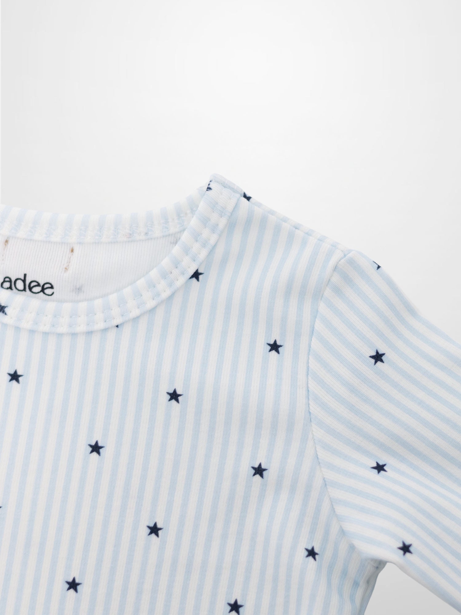 Blue Star Pajamas for boys by Adee; striped light blue and white top with navy stars.