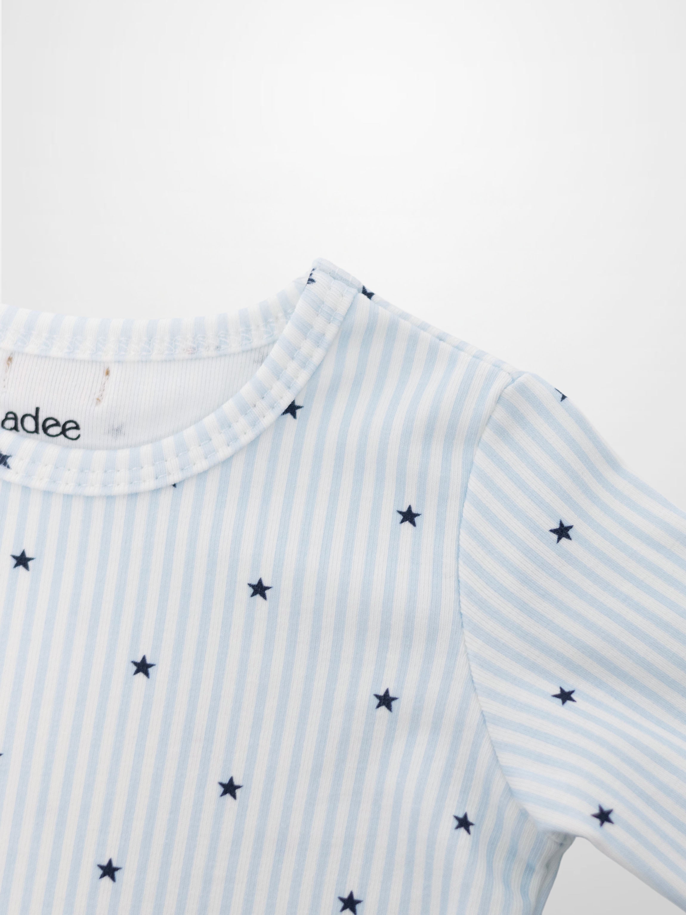 Blue Star Pajamas for boys by Adee; striped light blue and white top with navy stars.