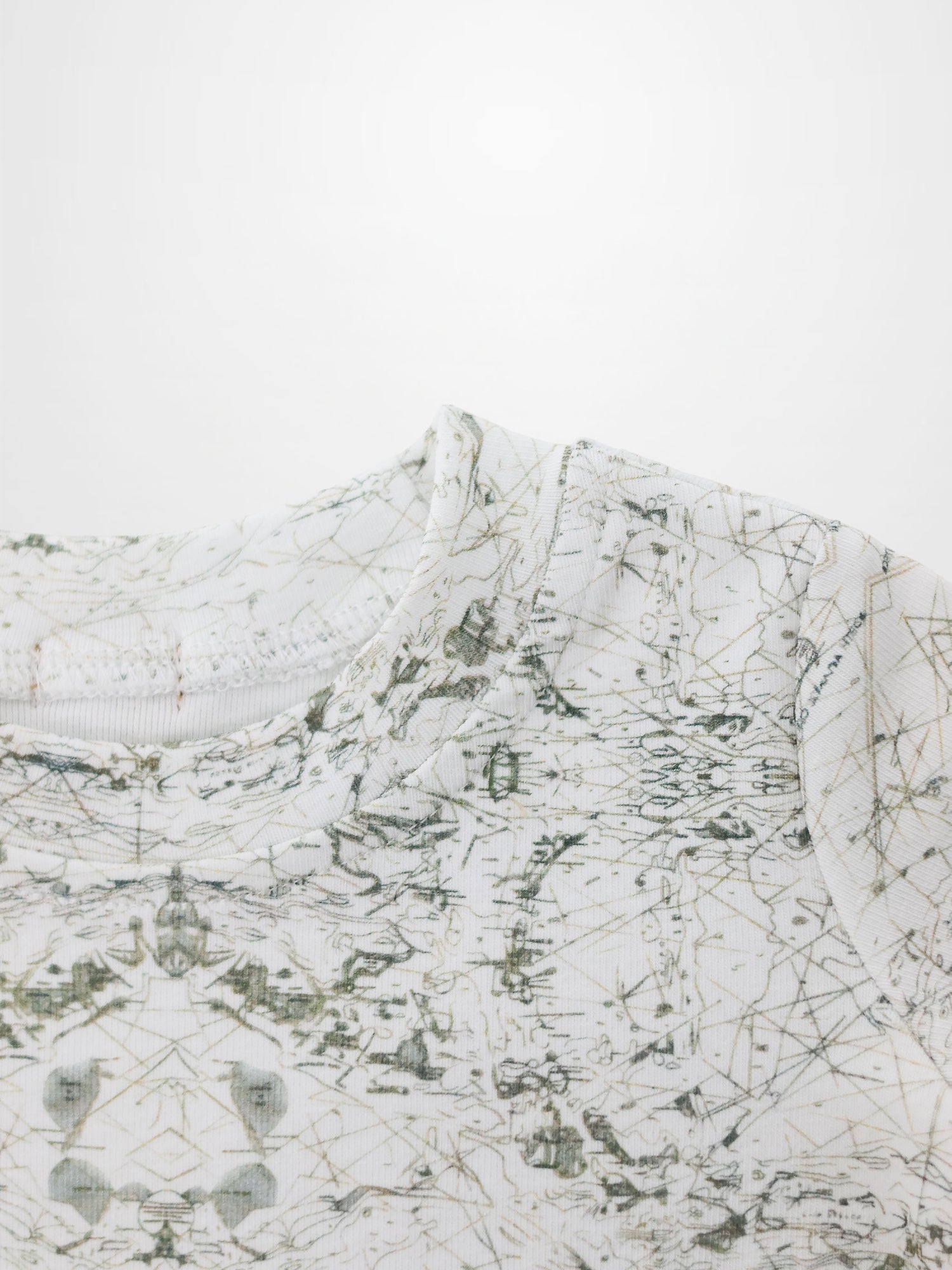 Map T-shirt for boys by Adee; white fabric with fine sage green map-like scribble print